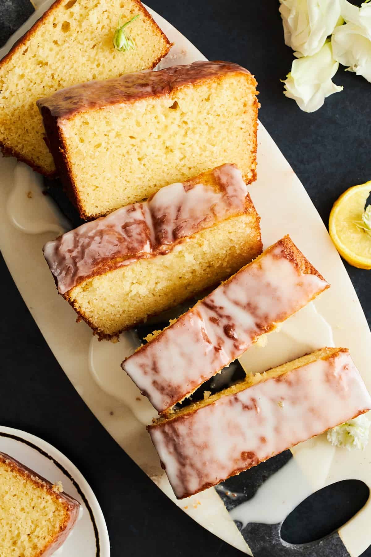 Slices of glazed Starbucks lemon loaf.