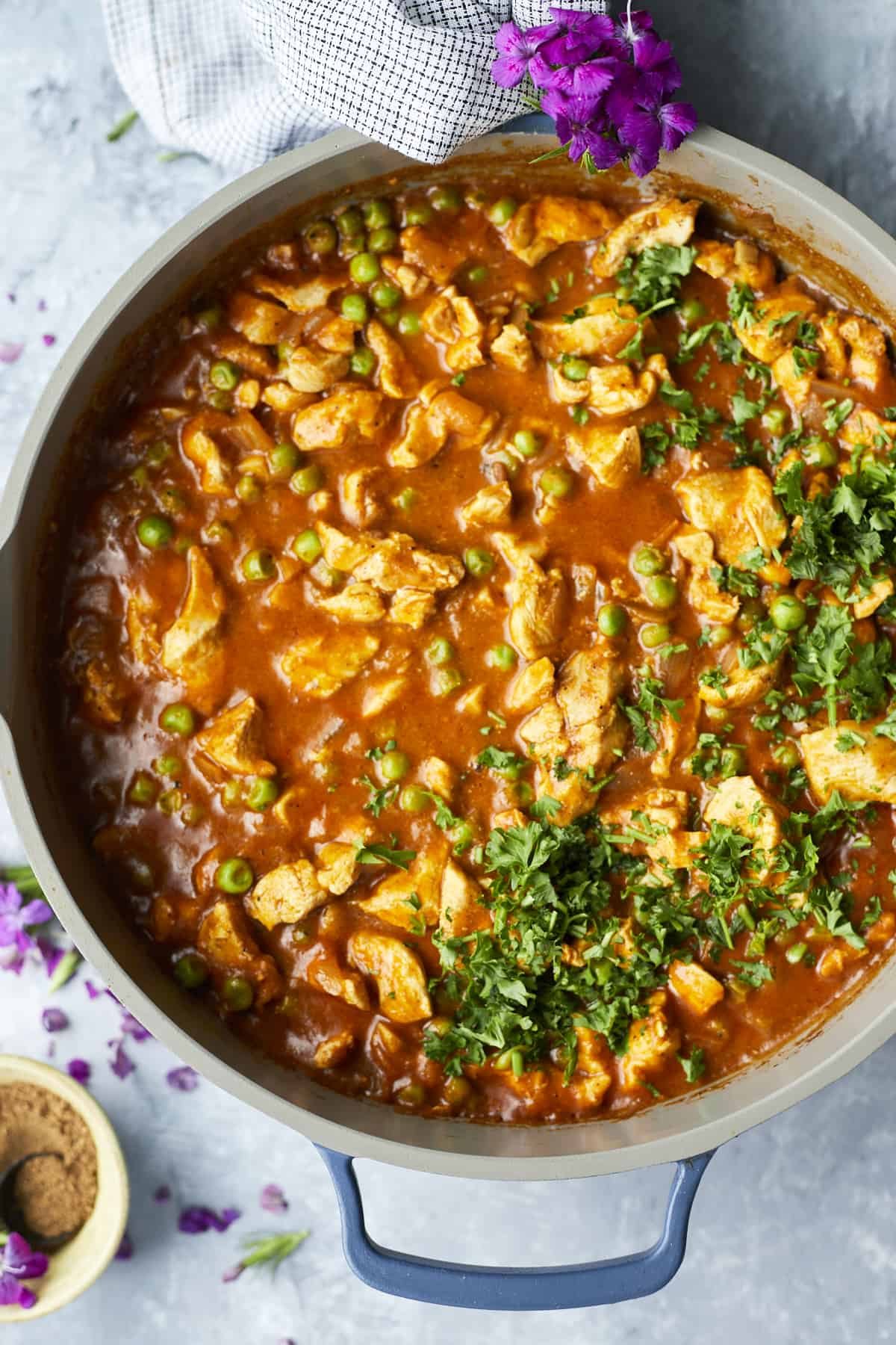 overhead madras curry chicken in a pan