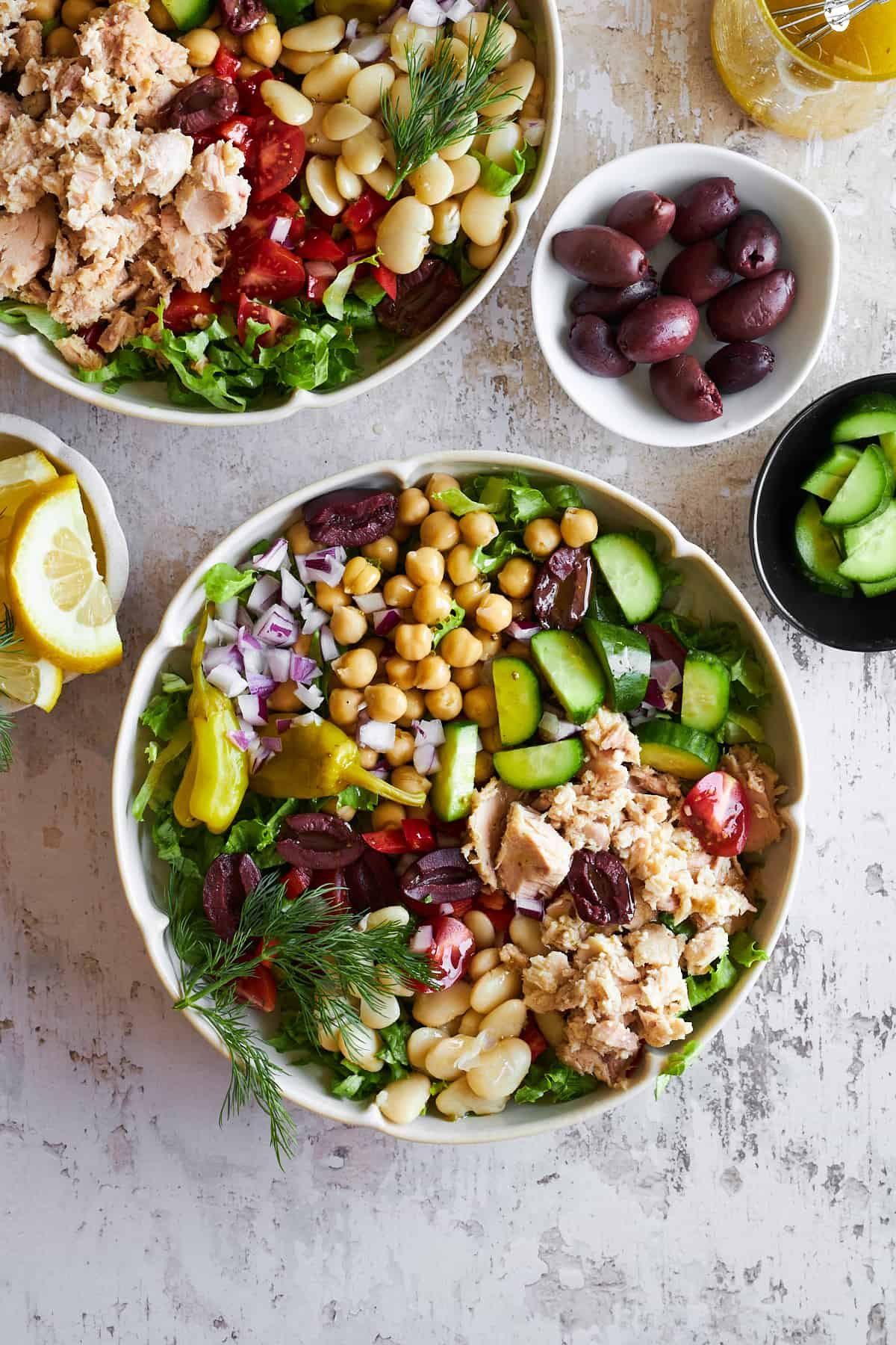 Two bowls of Mediterranean tuna salad.