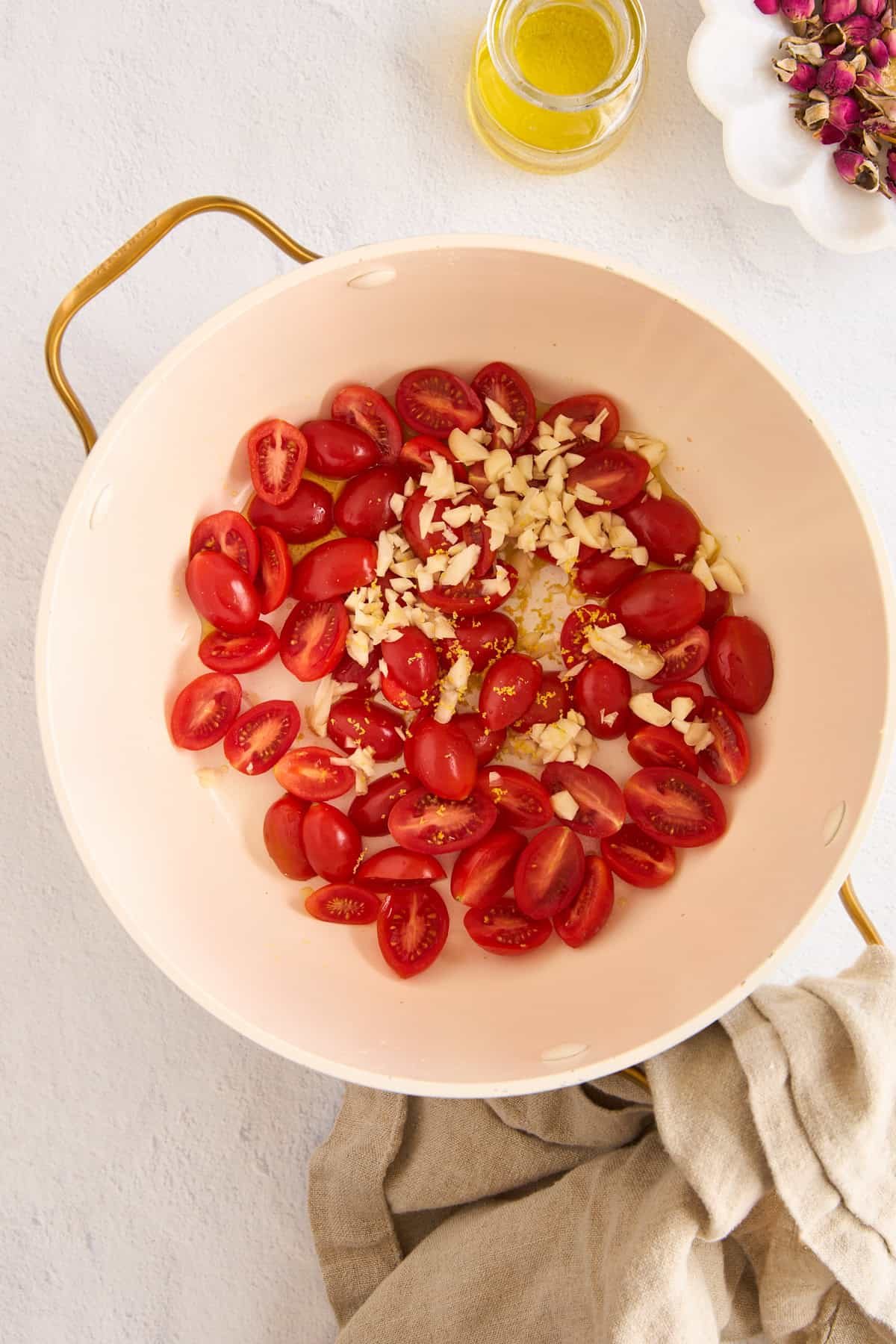 Tomatoes and garlic in a pasta pot.