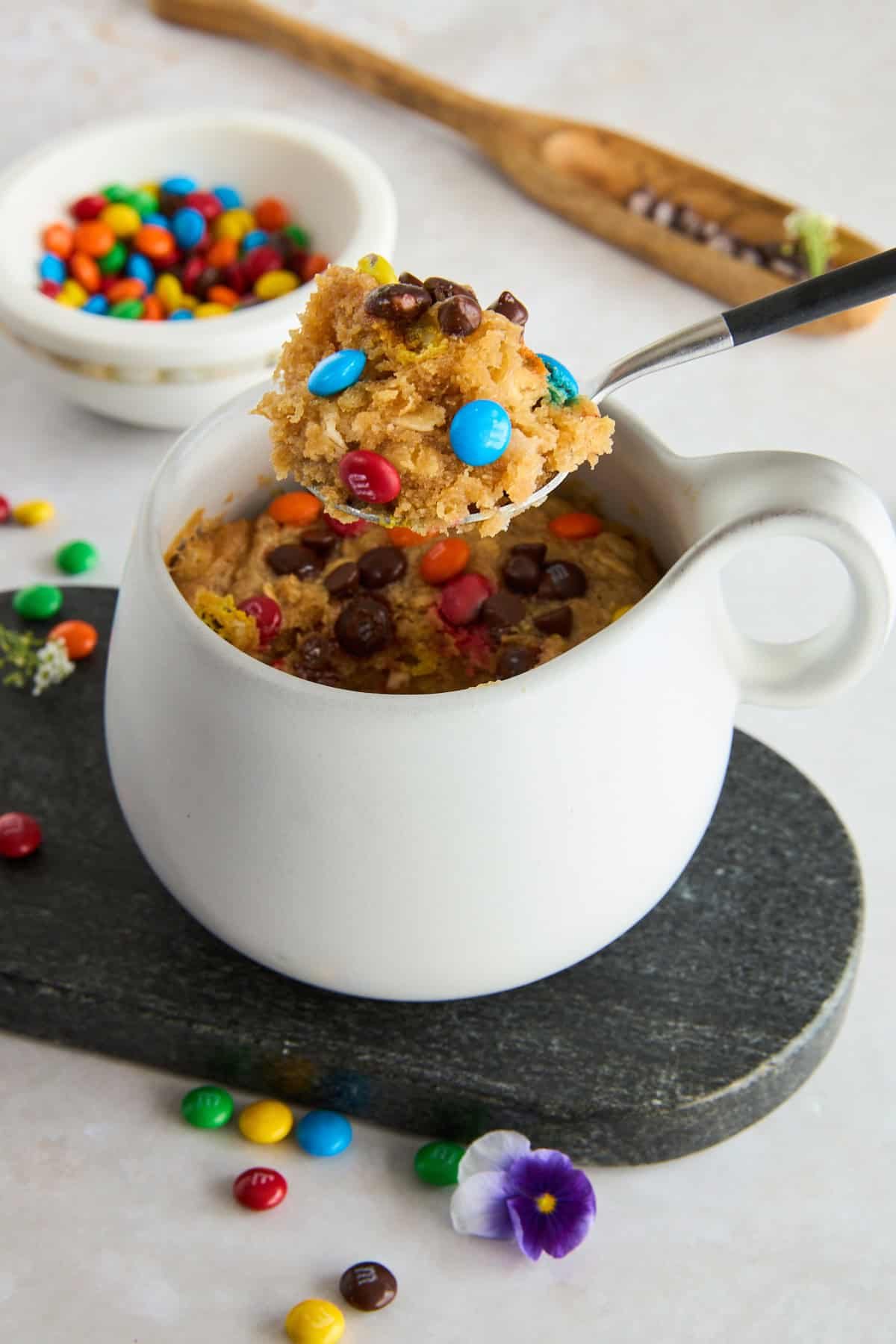 Monster Cookie Mug Cake at the Table