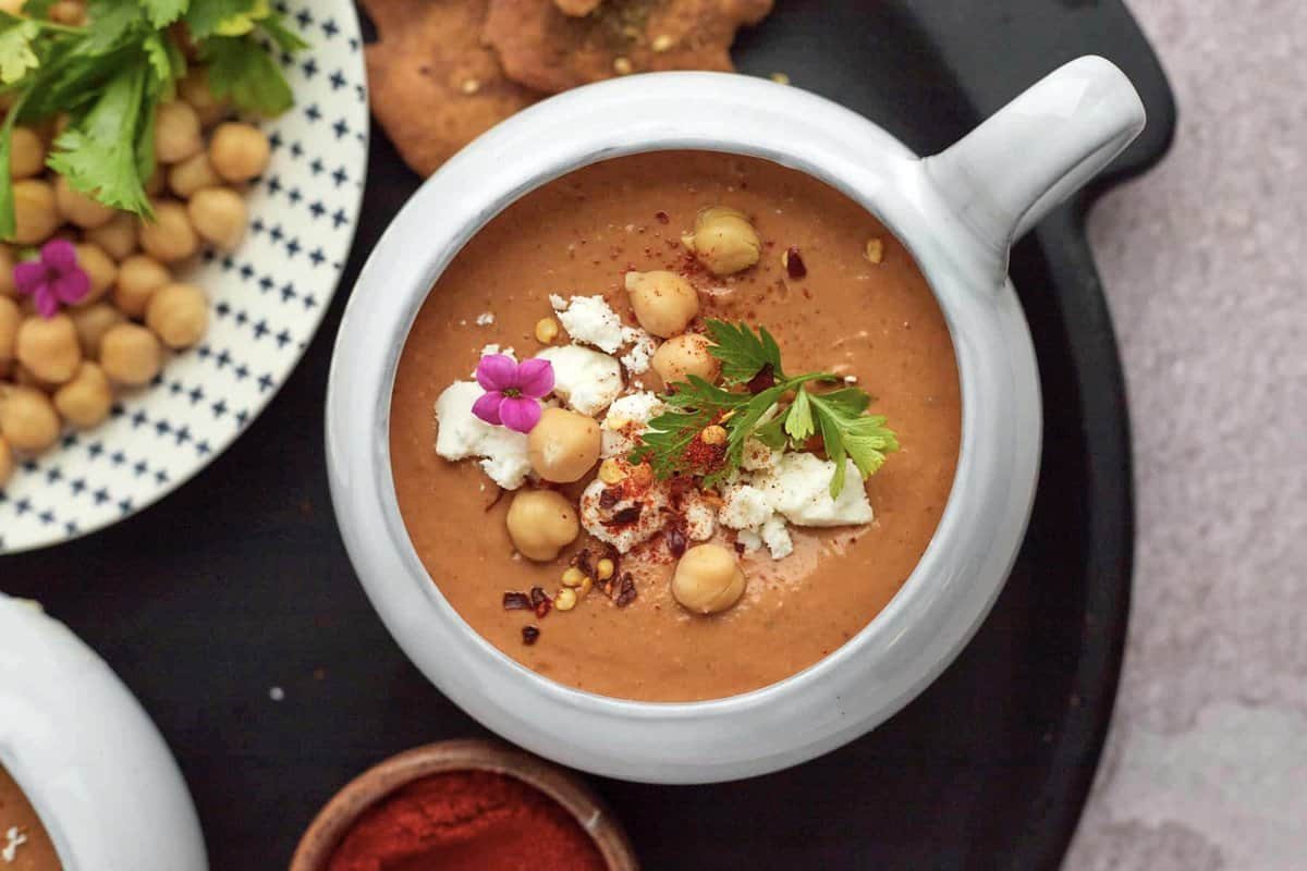 Moroccan Spicy Tomato Soup at the Table