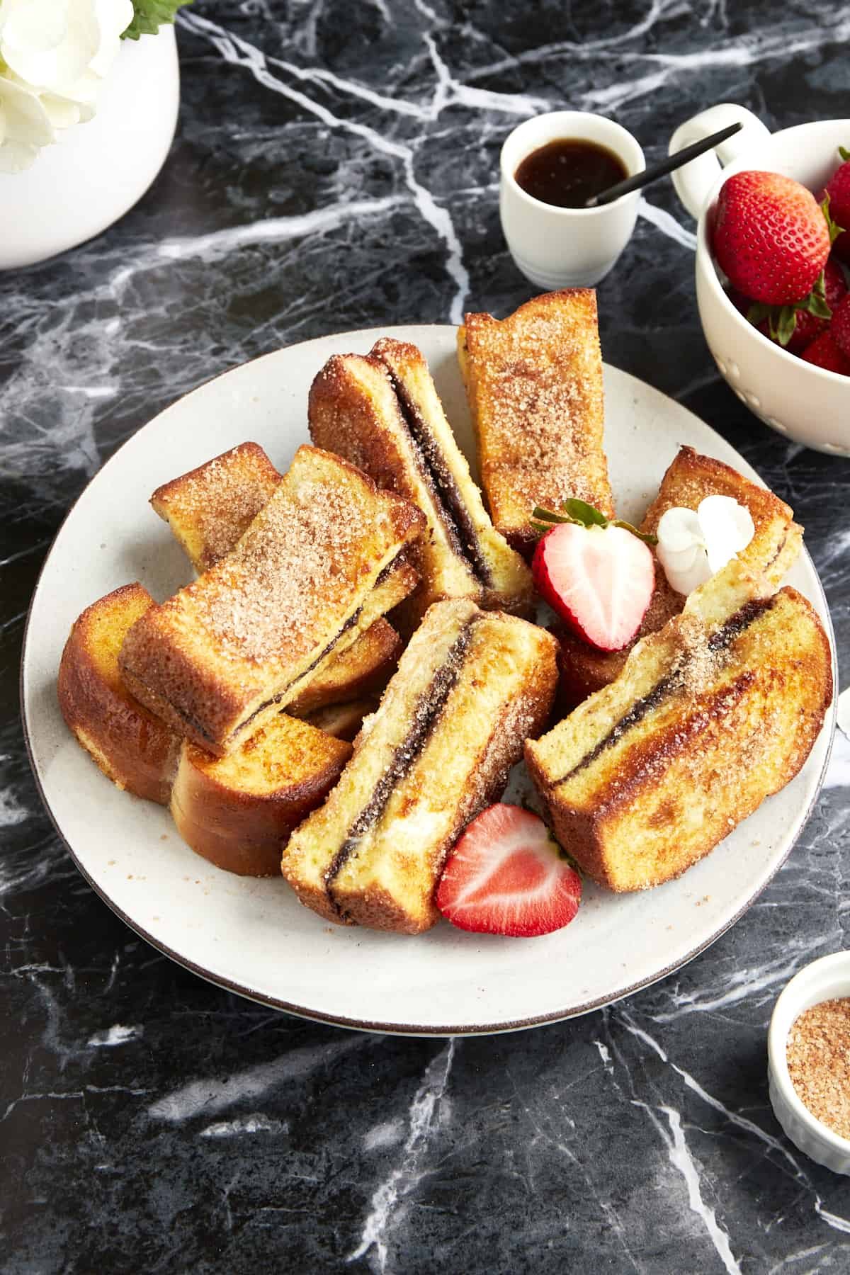 A plate of Nutella stuffed French toast sticks.