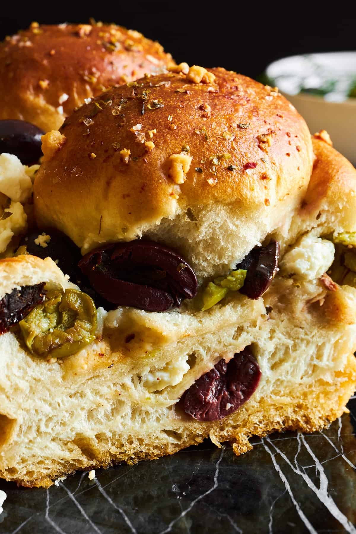 Close up image of olive bread.