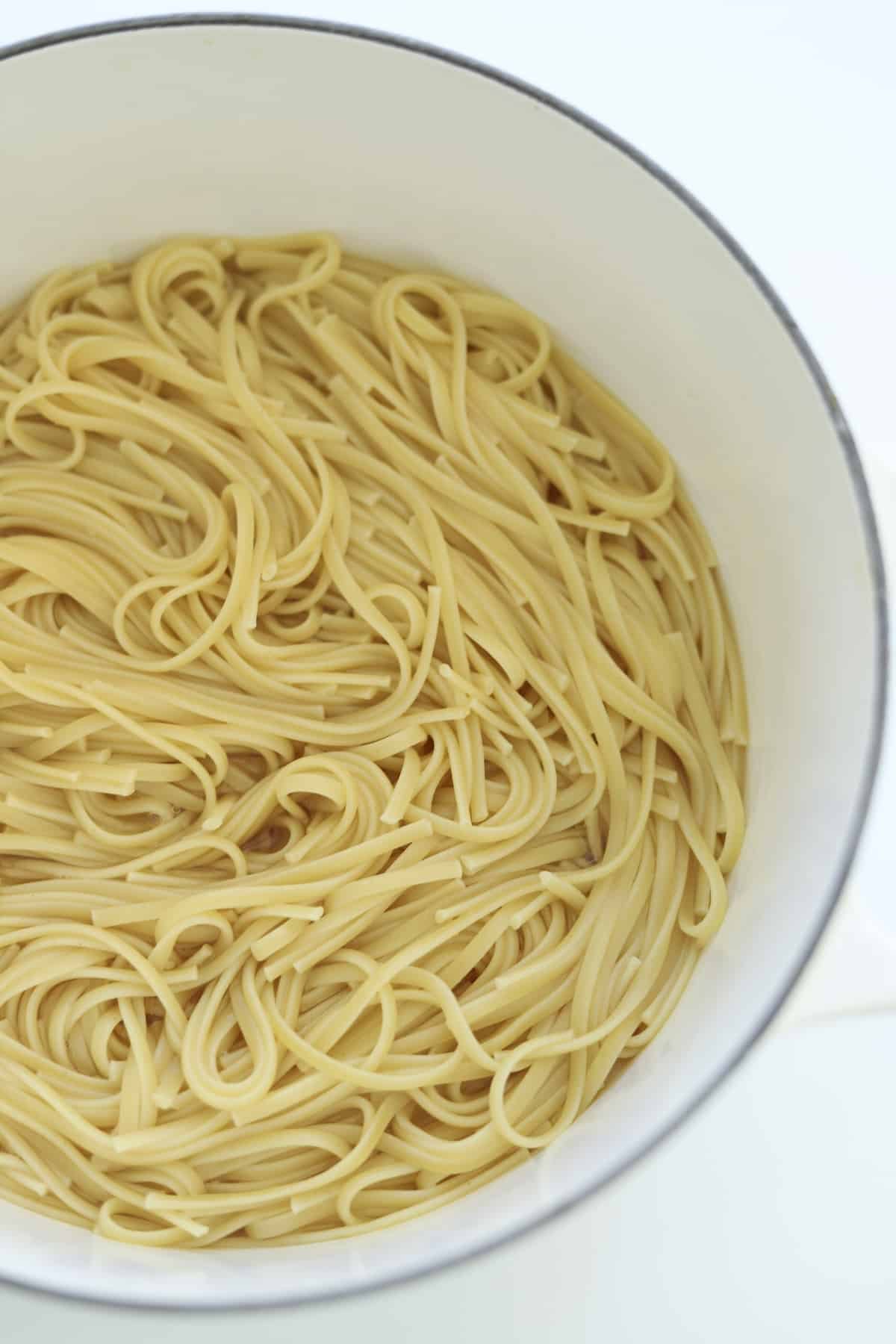 cooked spaghetti noodles in a pot