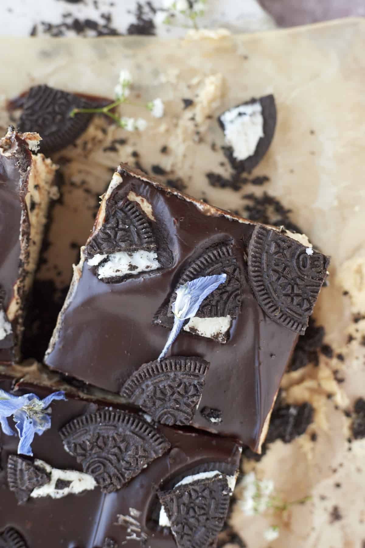 overhead image of Oreo peanut butter bars topped with Oreo pieces