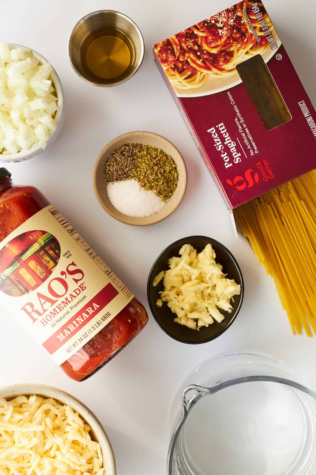 Ingredients to make oven baked spaghetti.