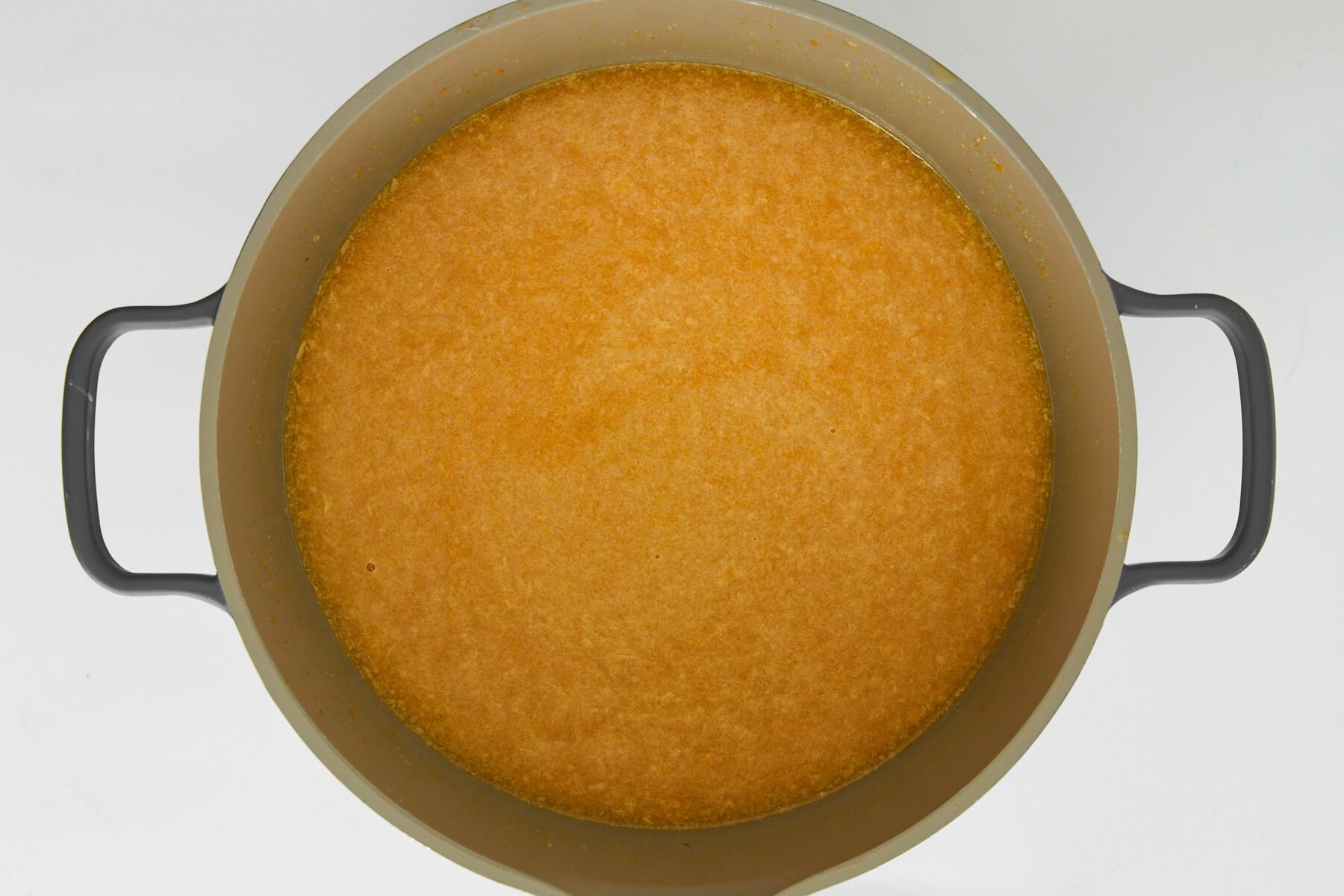 A pot of broth for pastina soup.