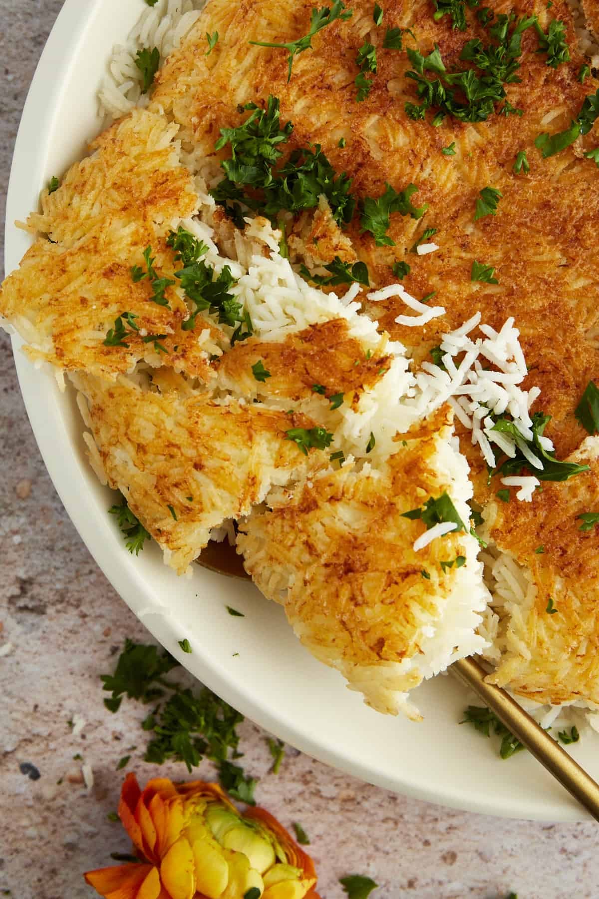 a serving of Persian rice being lifted with a spoon