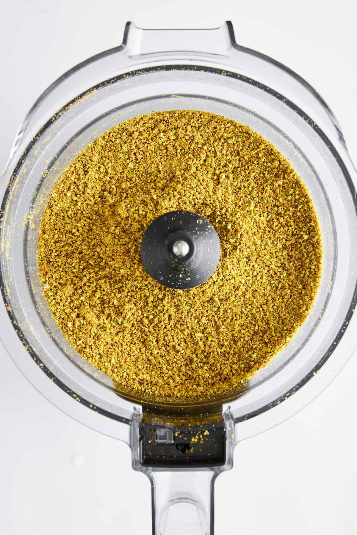 Blended pistachios in a food processor.