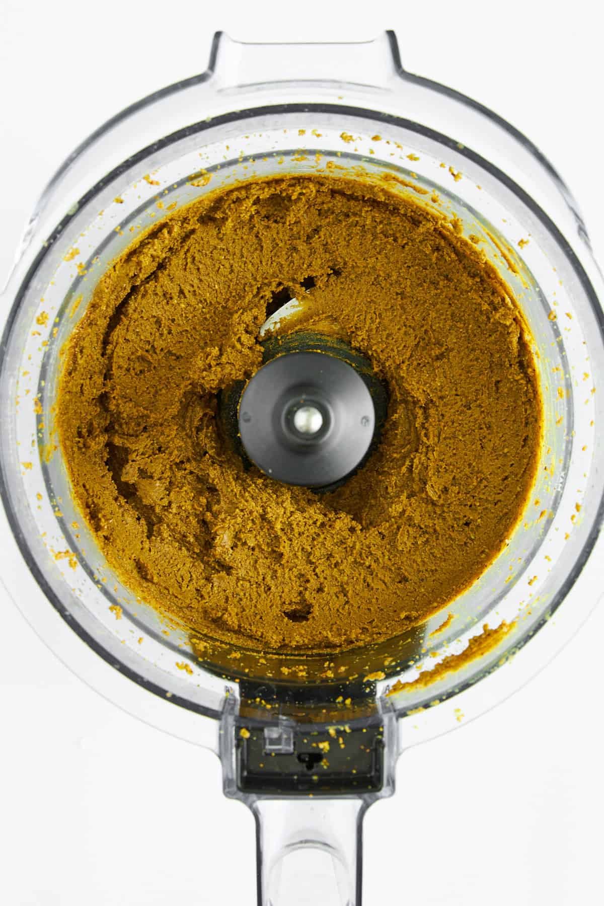 Pistachio butter in a food processor.