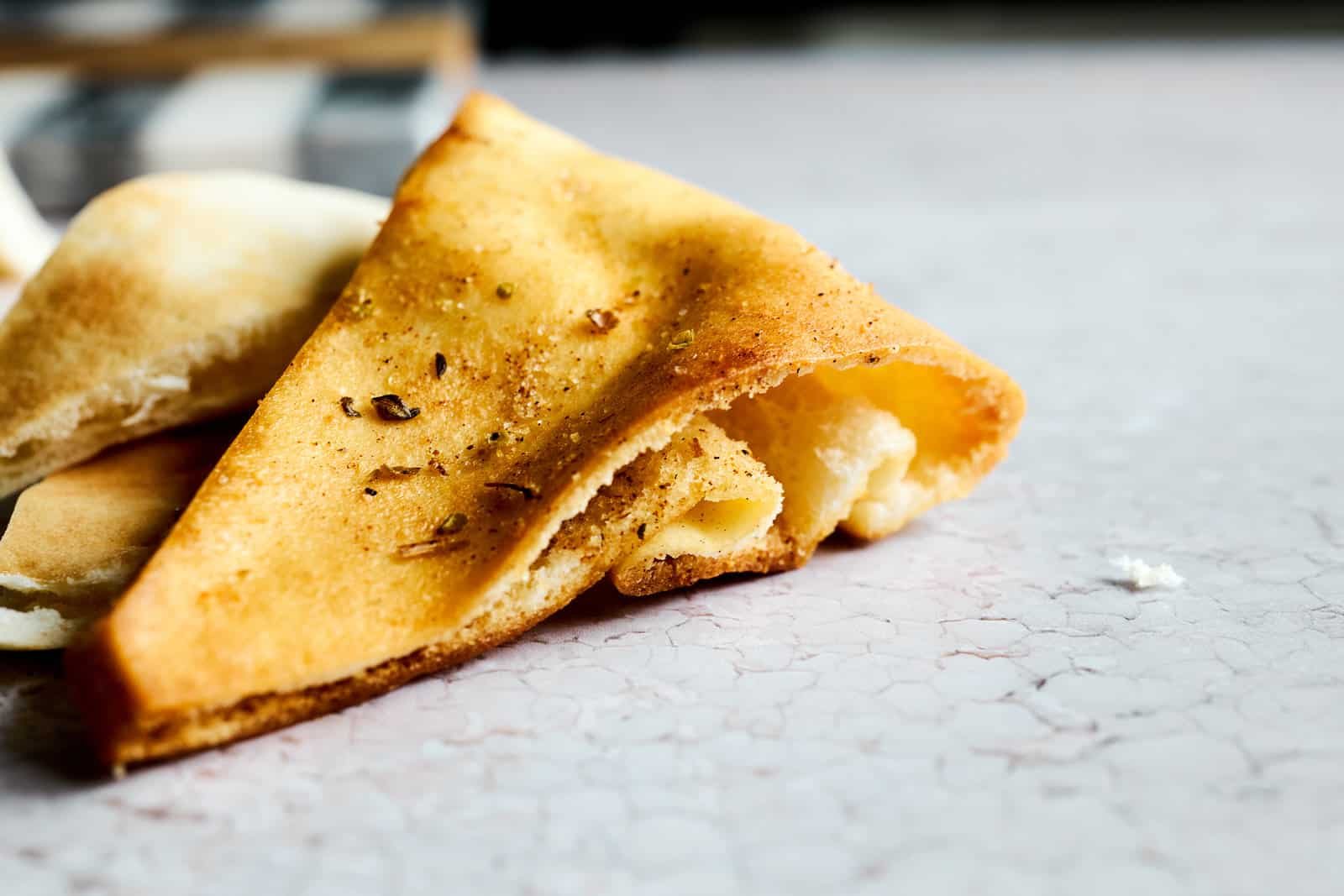 Side view of a homemade pita chips.