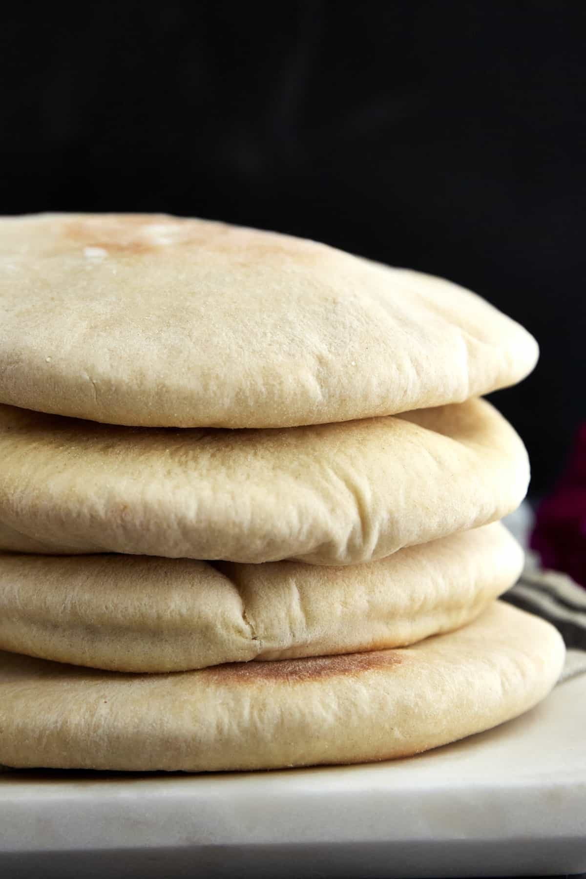 a stack of four pita pockets.