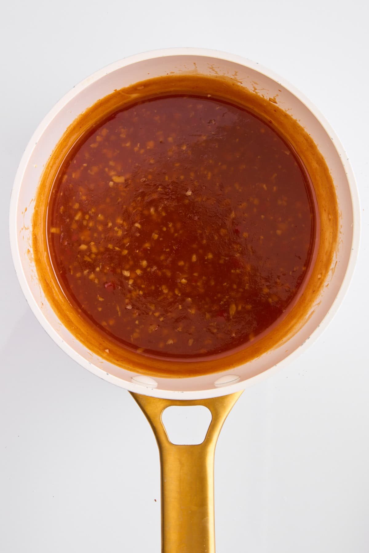 Orange chicken sauce in a pot.