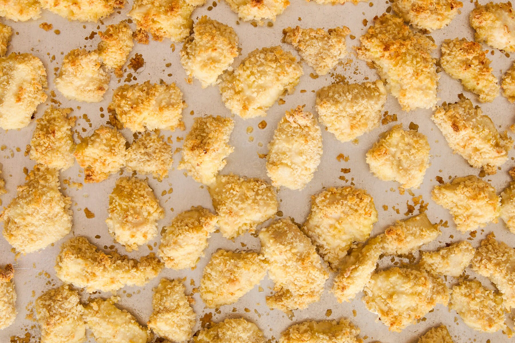 Baked breaded chicken pieces.