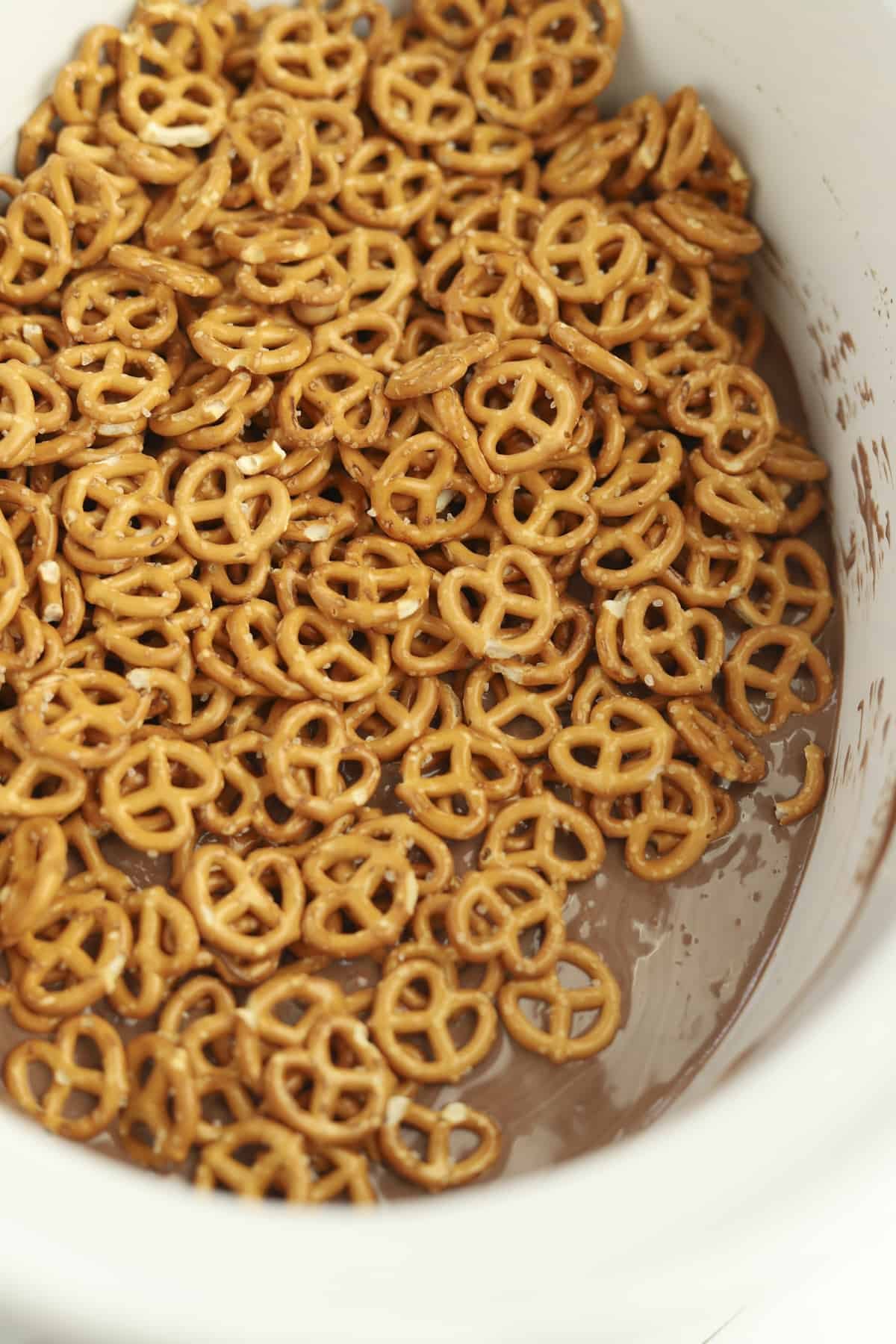melted chocolate with pretzels