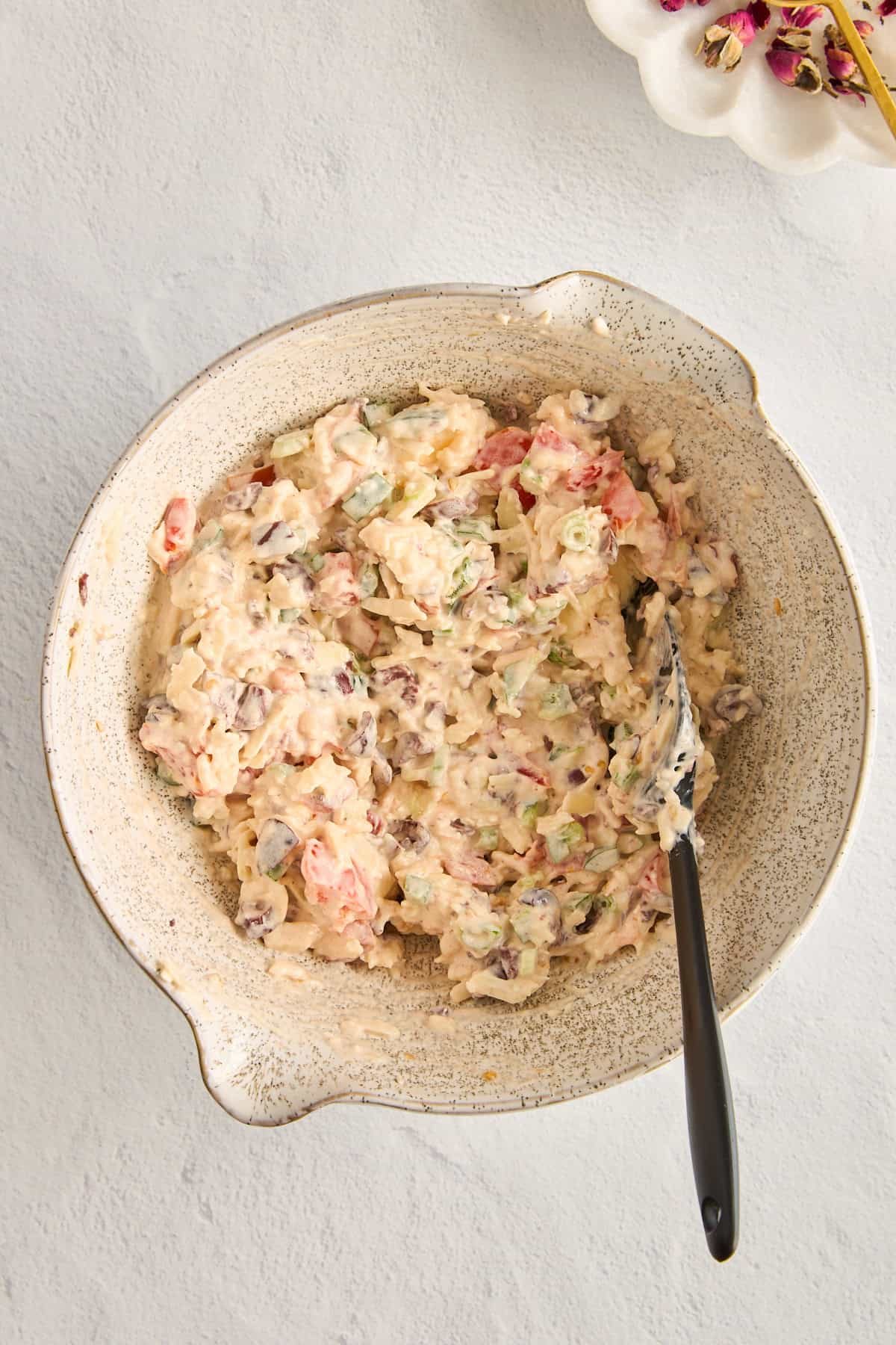 A cheese dip mixture in a bowl.