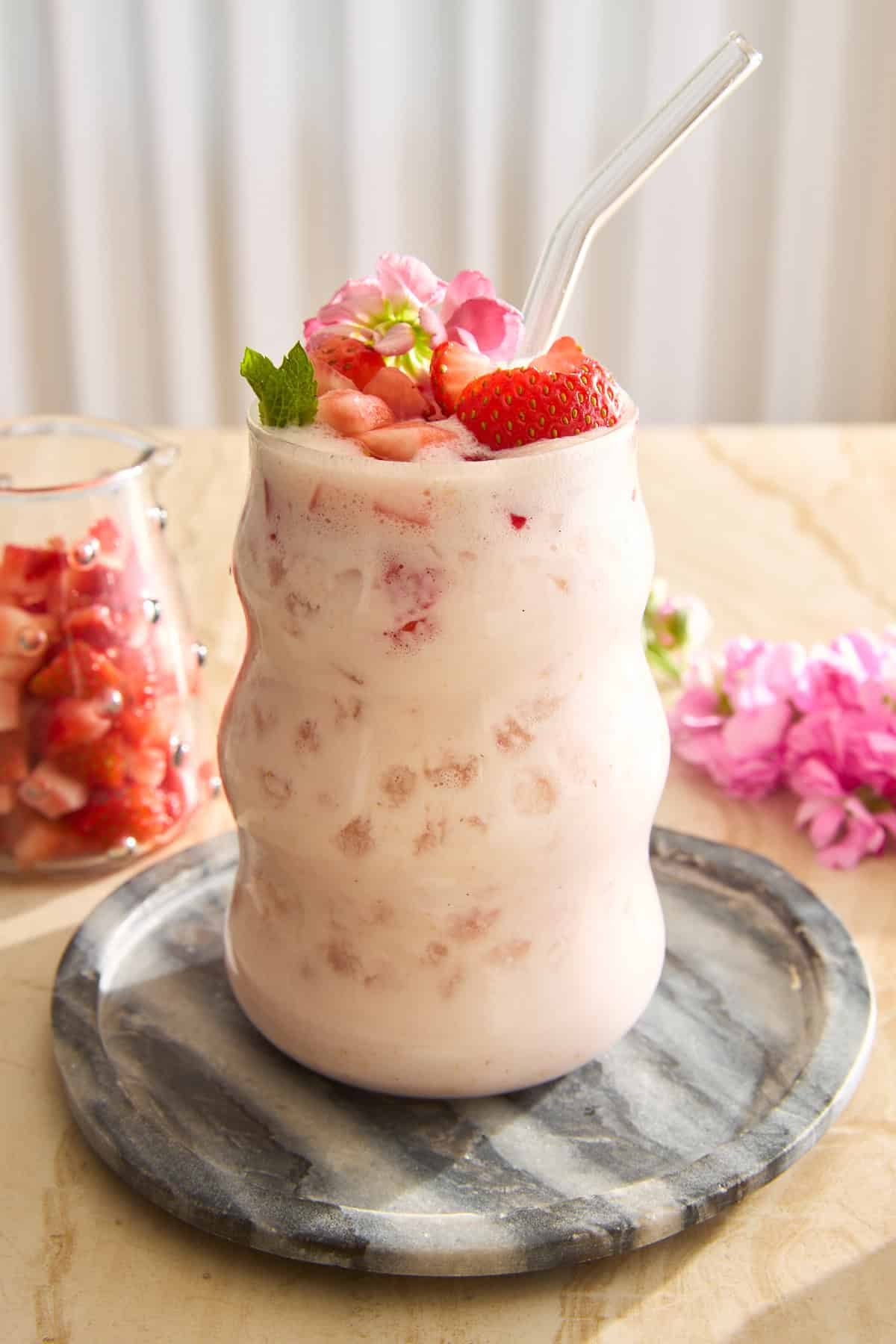 Strawberry Agua Fresca with Condensed Milk at the Table