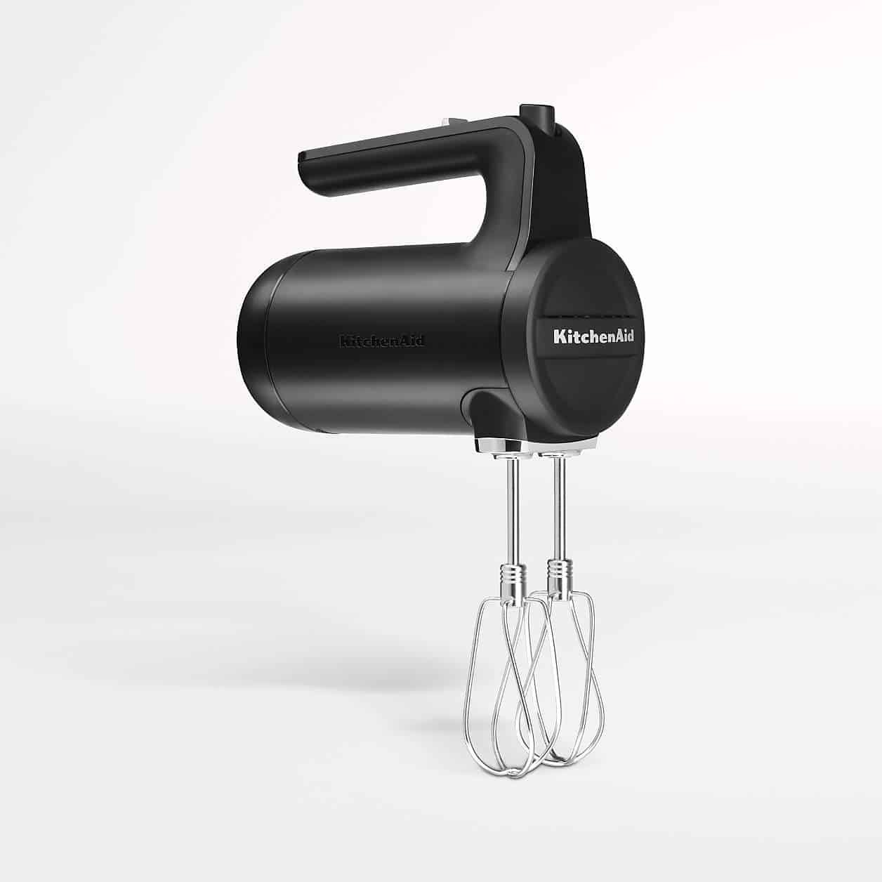 A black cordless hand mixer.