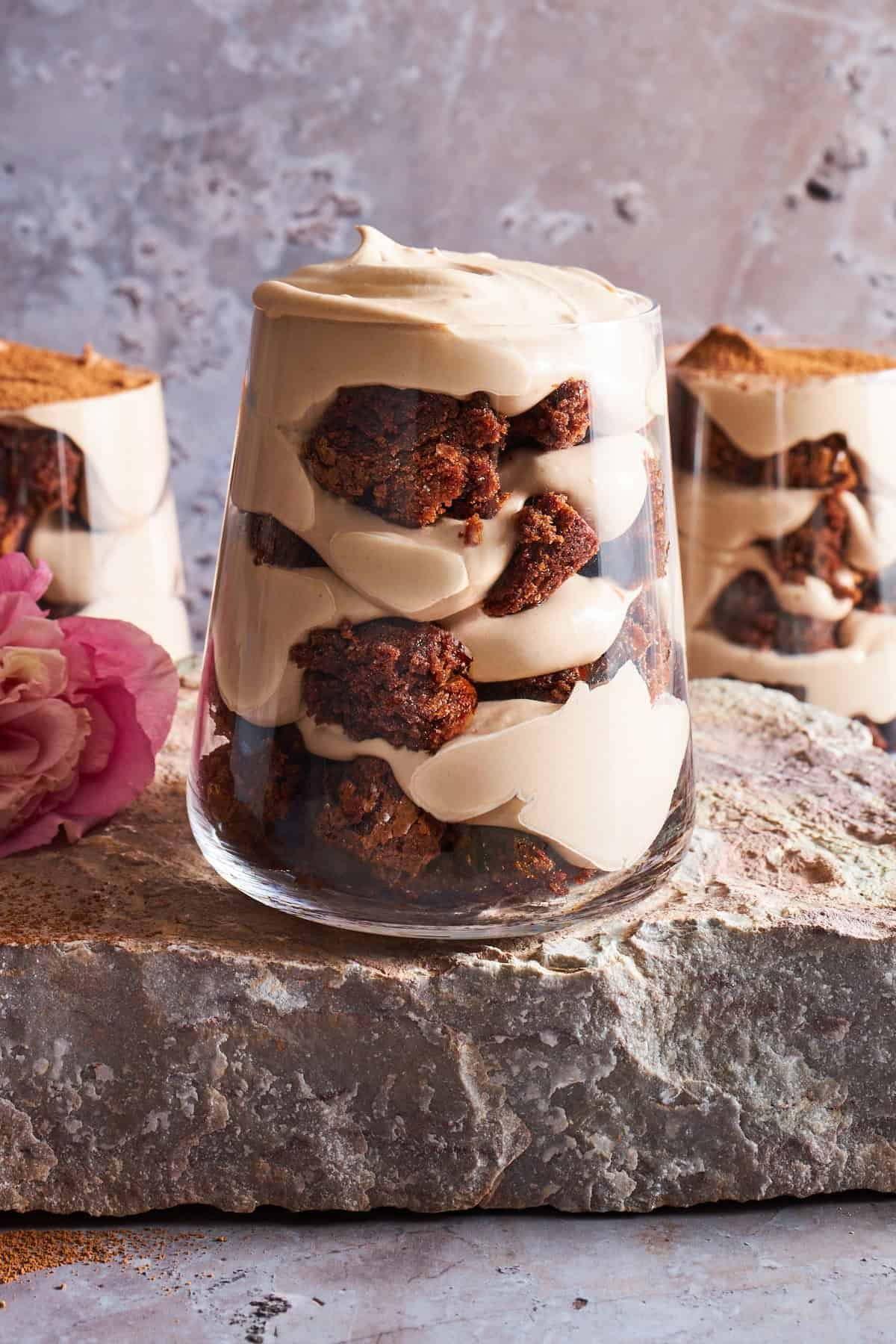 Three tiramisu brownie parfait cups.