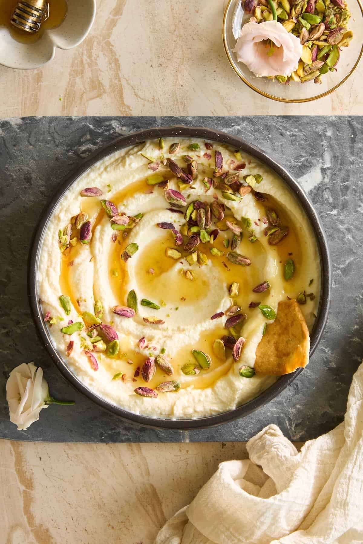 Whipped Ricotta Dip with Honey and Pistachios at the Table