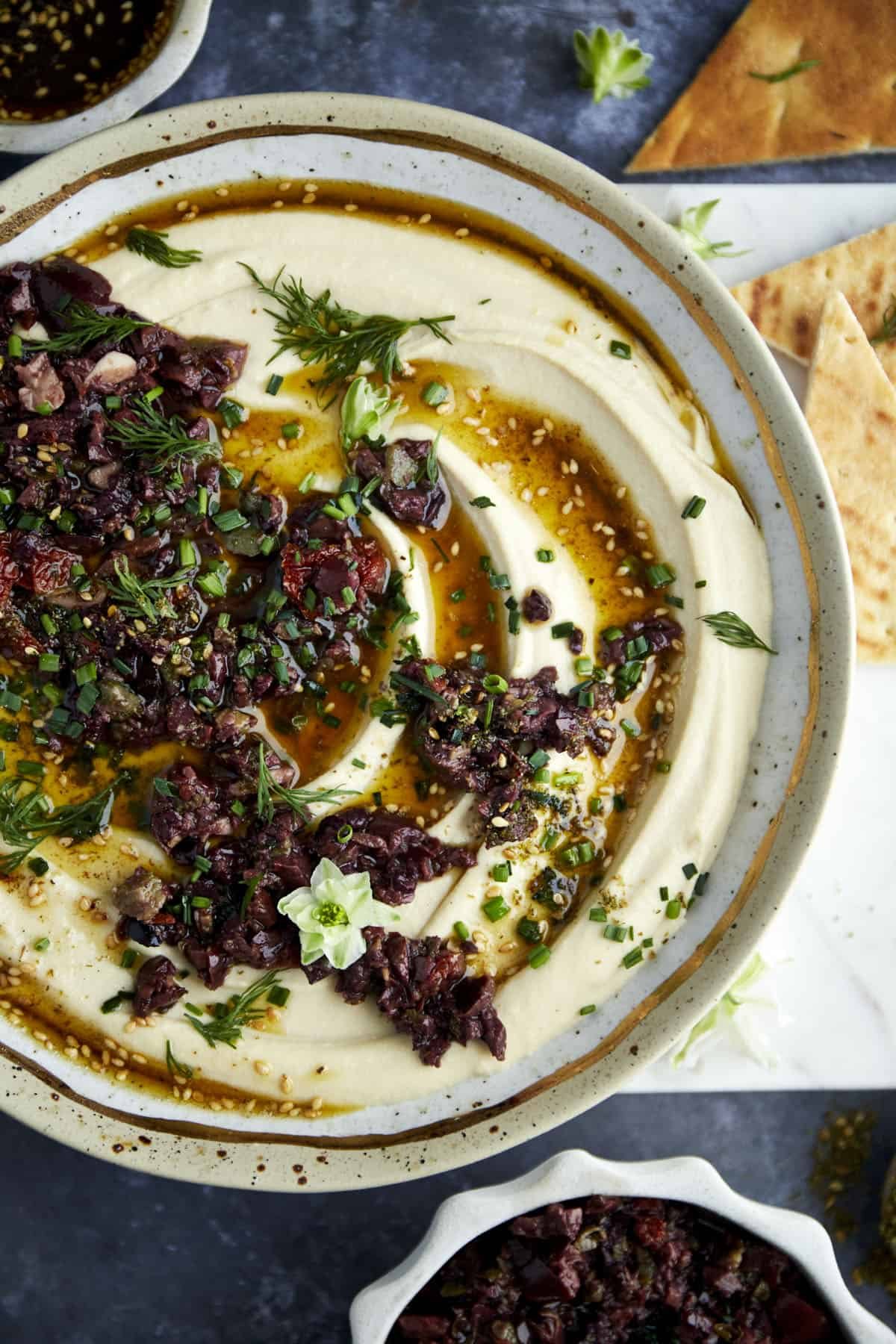 Za’atar Hummus with Olive Tapenade at the Table