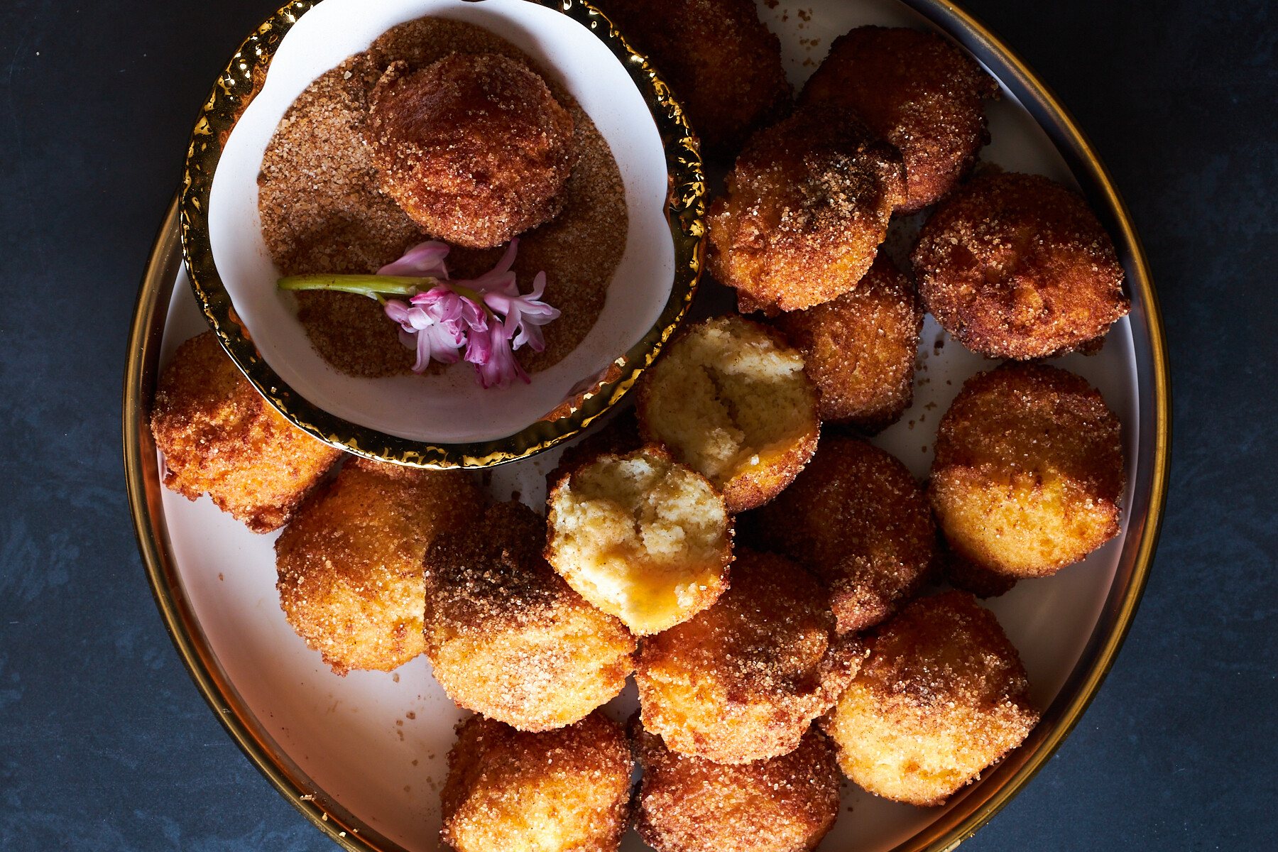 Zeppole donuts on aplatter.