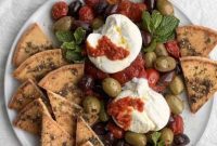 Burrata Perfection with Sun Kissed Tomatoes and Crispy Zaatar Pita
