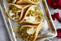 Pistachio-Adorned Atayef with Cloud-Like Cream