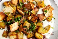 Harissa Potatoes with Whipped Tahini & Pita Crisps