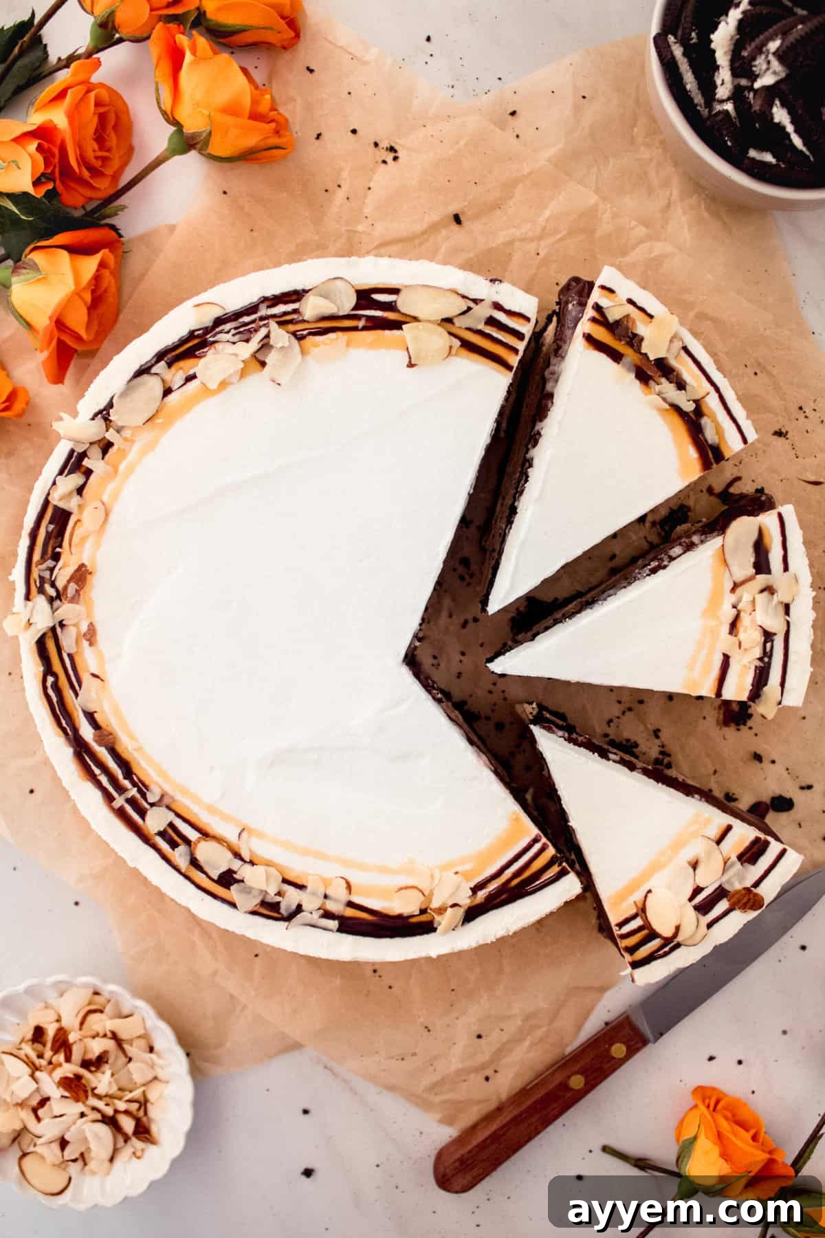 A perfectly sliced Billy Miner Ice Cream Pie showcasing its decadent layers of Oreo crust, coffee ice cream, and fudge, ready to be enjoyed.