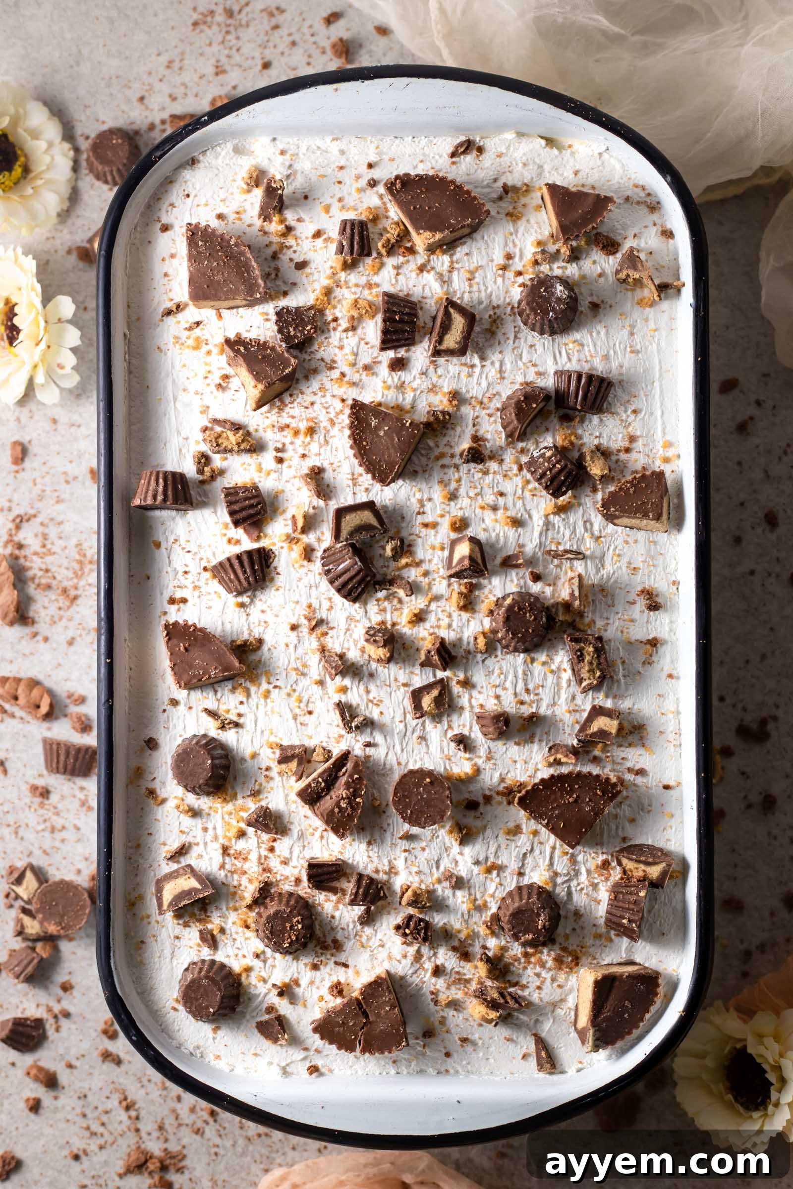 Close-up of no-bake icebox cake topped with peanut butter cups
