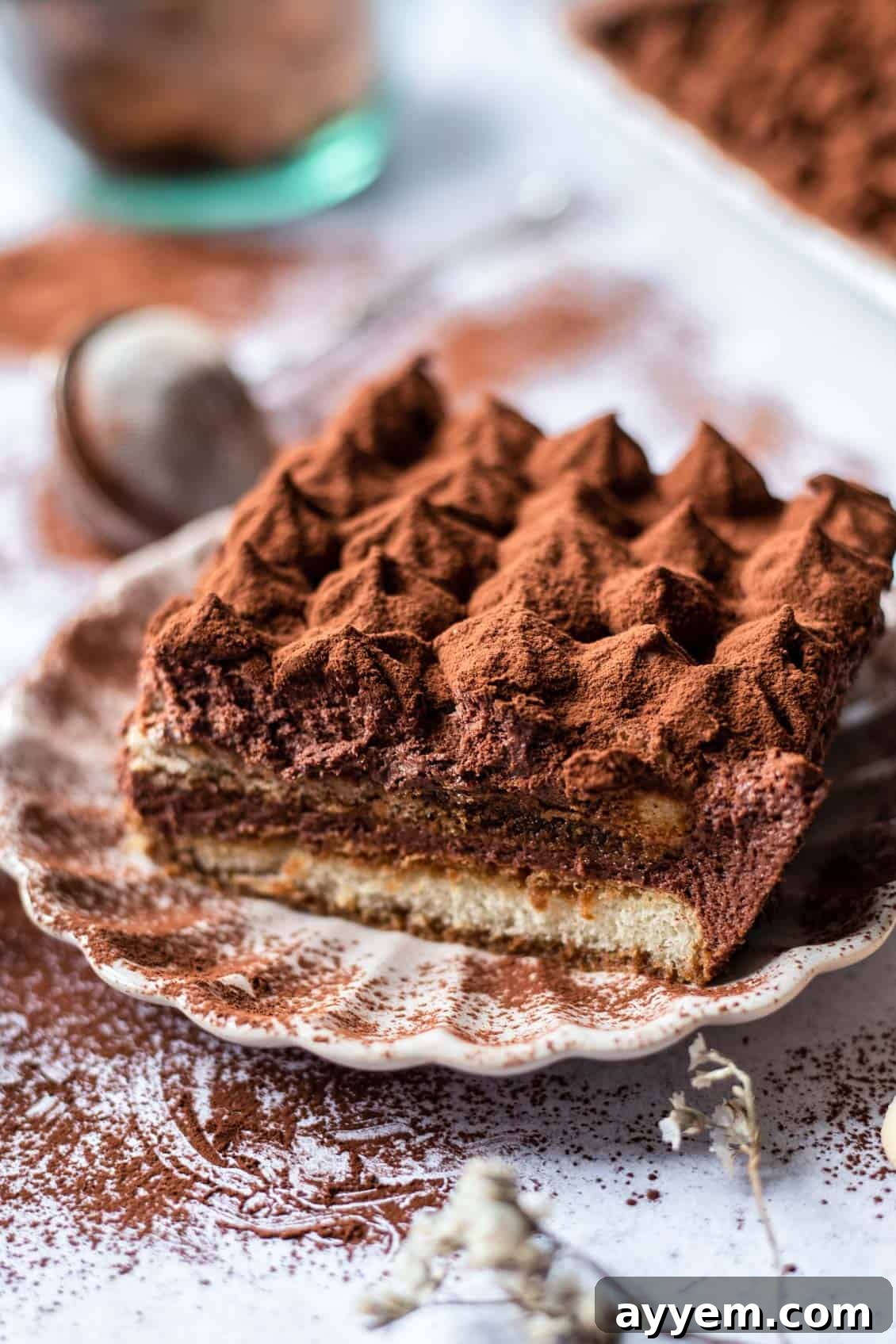 A beautiful slice of easy chocolate tiramisu on a plate, showcasing its delicious layers.