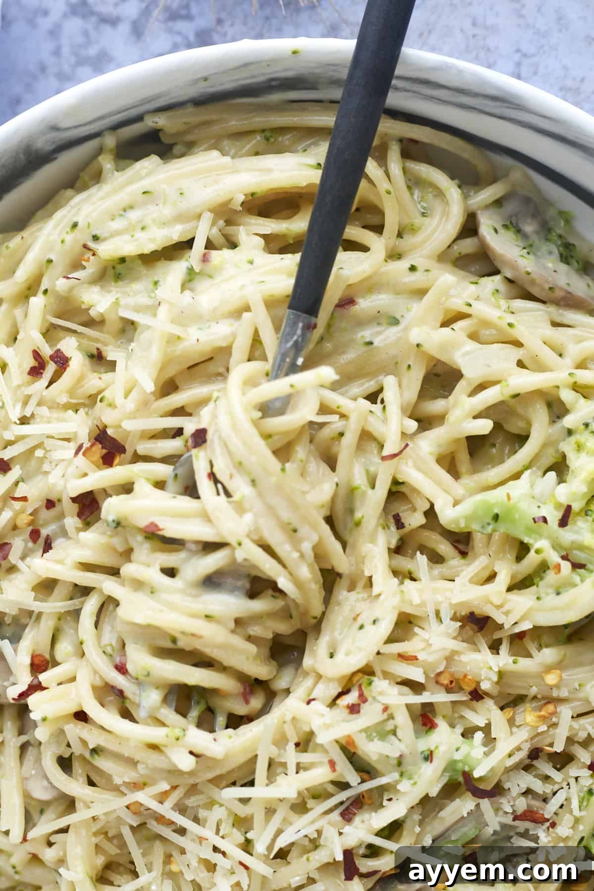 Effortless Primavera One-Pot Wonders 5 a fork spinning around a bit of one pot pasta primavera