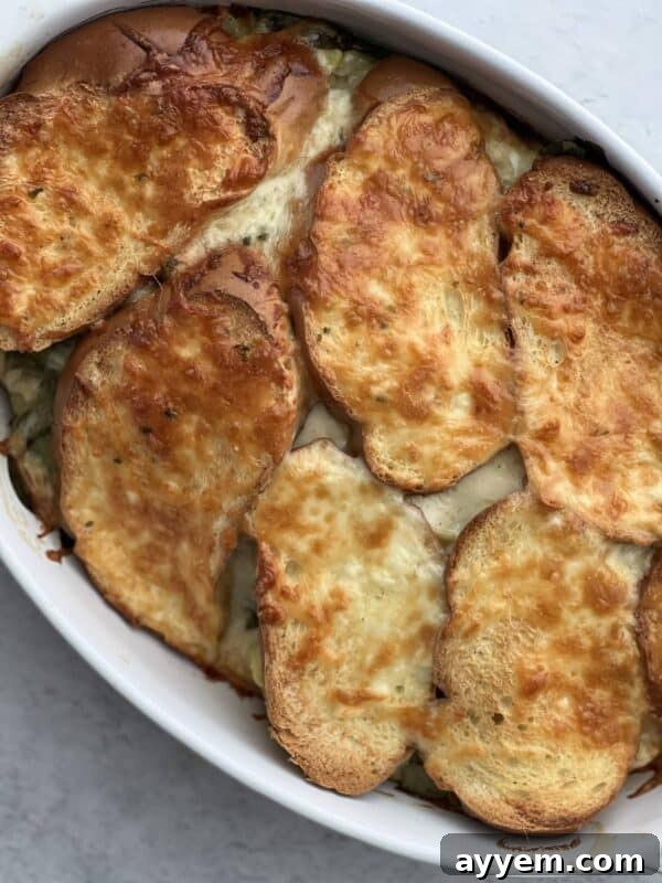spinach and artichoke grilled cheese sandwiches in a baking dish