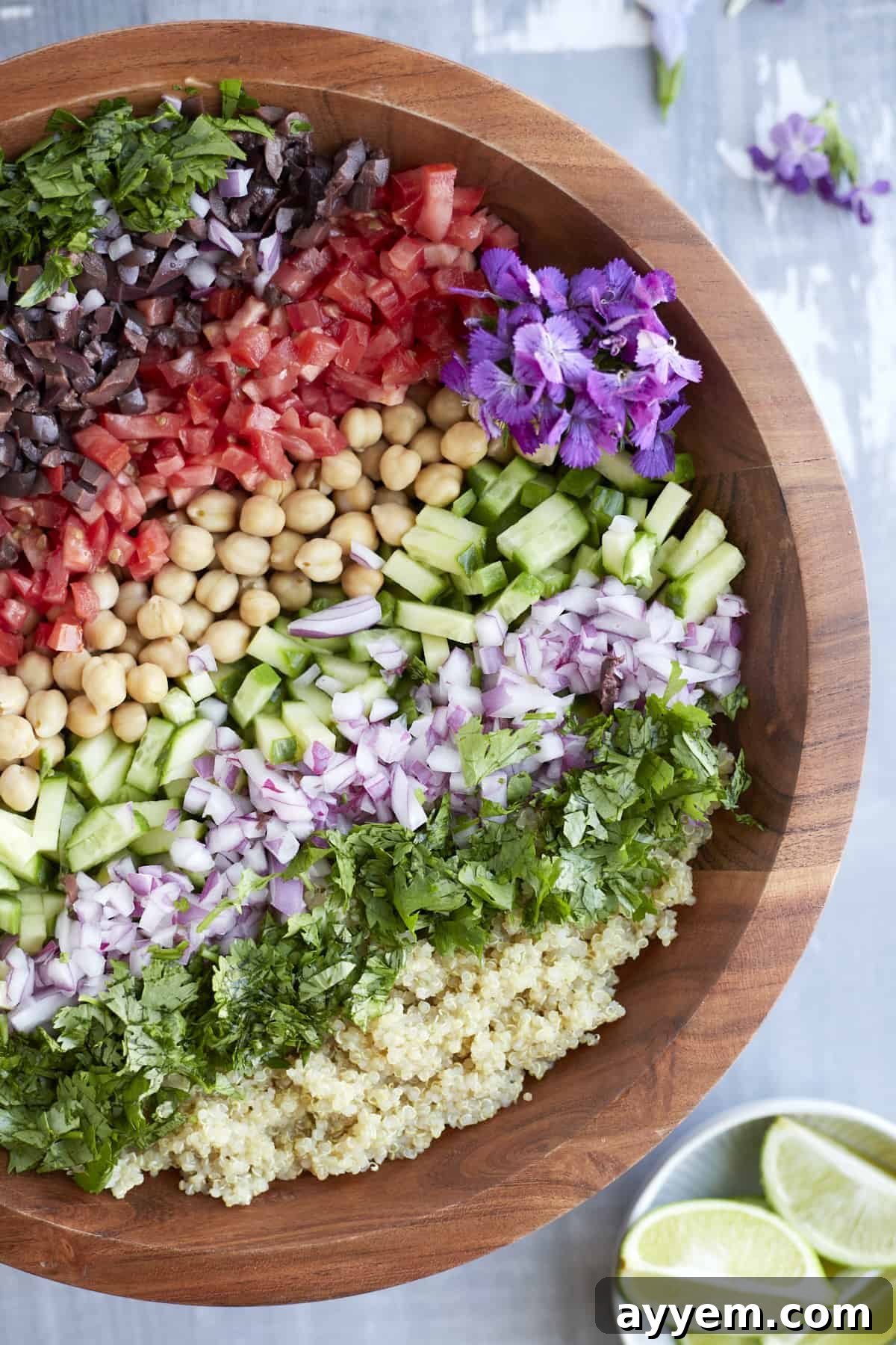 Overhead image of a Mediterranean quinoa salad in a bowl.
