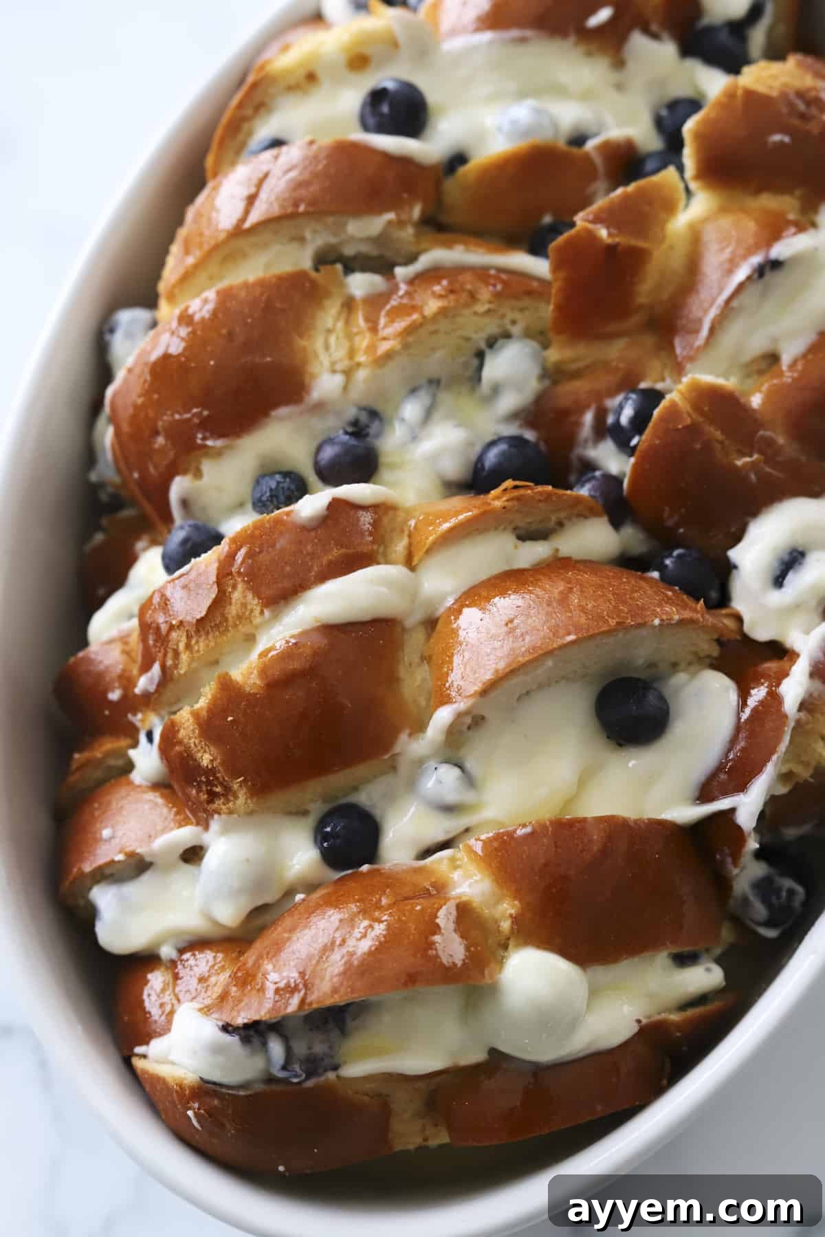 side view blueberry mascarpone french toast baking dish
