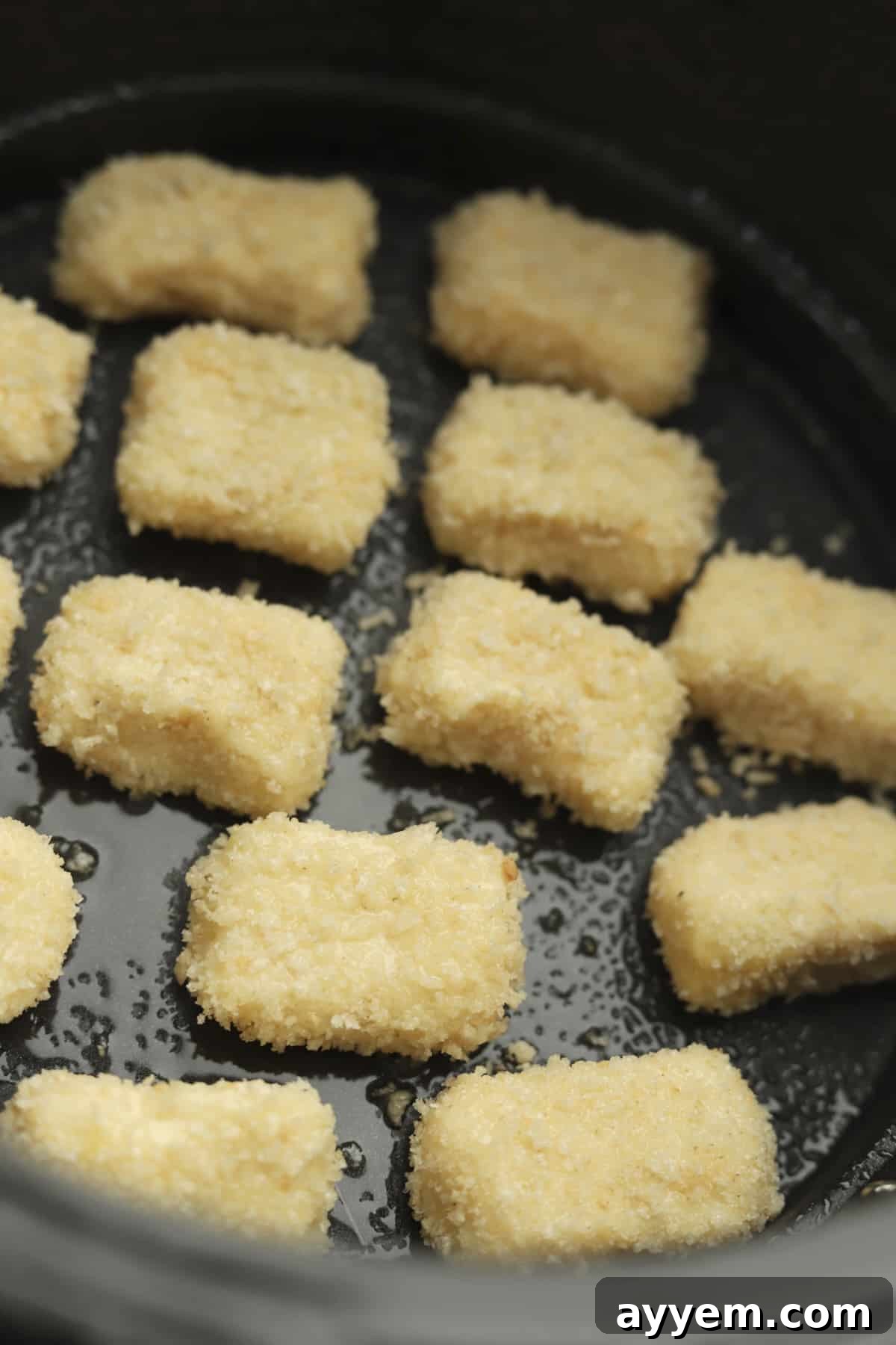 Shaped potato nuggets coated in panko breadcrumbs.