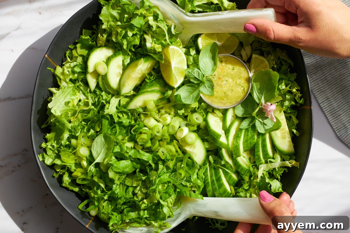 A bowl of green goddess salad.