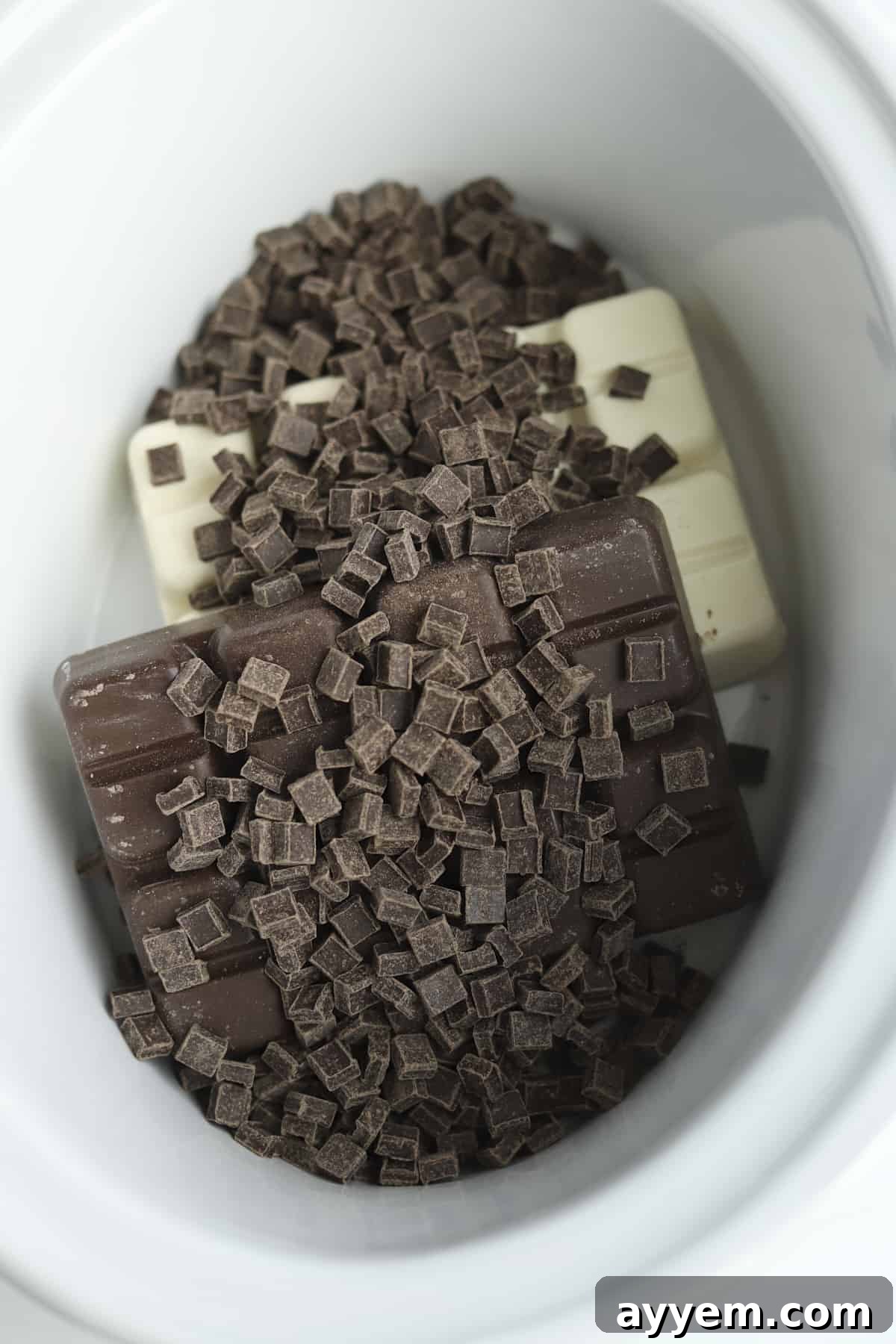 Close-up of slow cooker with chocolate melting inside