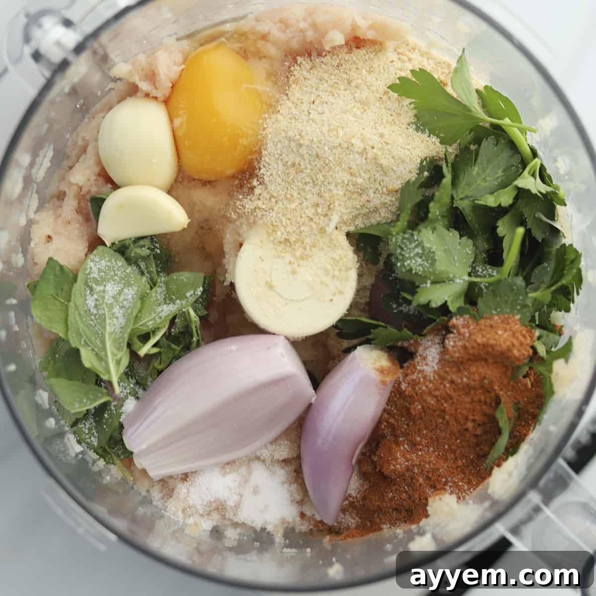 egg, fresh herbs, red onion, breadcrumbs, ground chicken, etc. in a food processor to make chicken kofta.