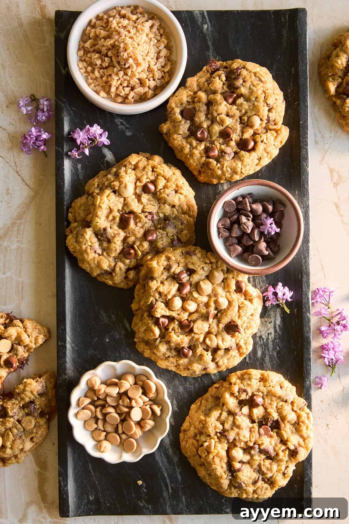 A warm, inviting platter overflowing with baked copycat Crumbl Mom's cookies, ready to be enjoyed.