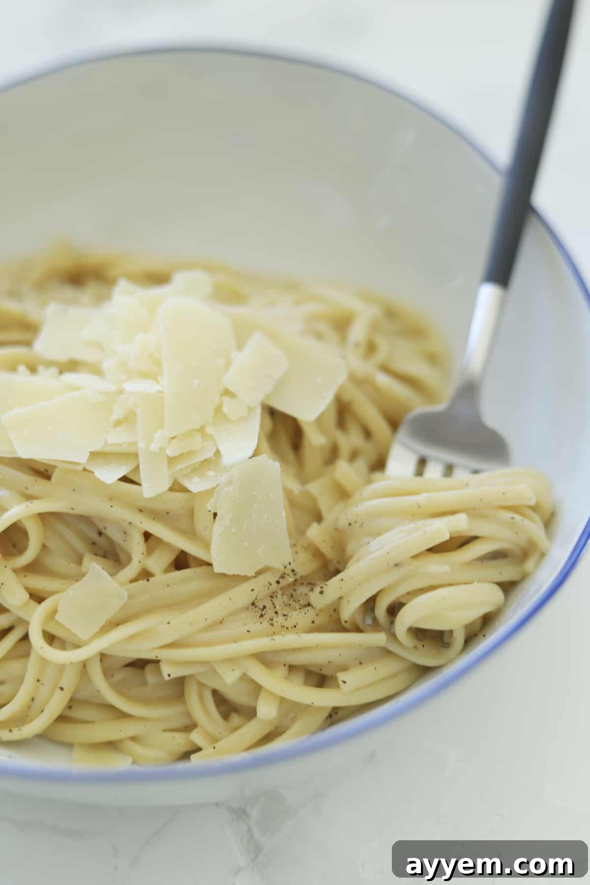 Ultimate One Pot Cacio e Pepe 7 bowl of pasta with parmesan cheese