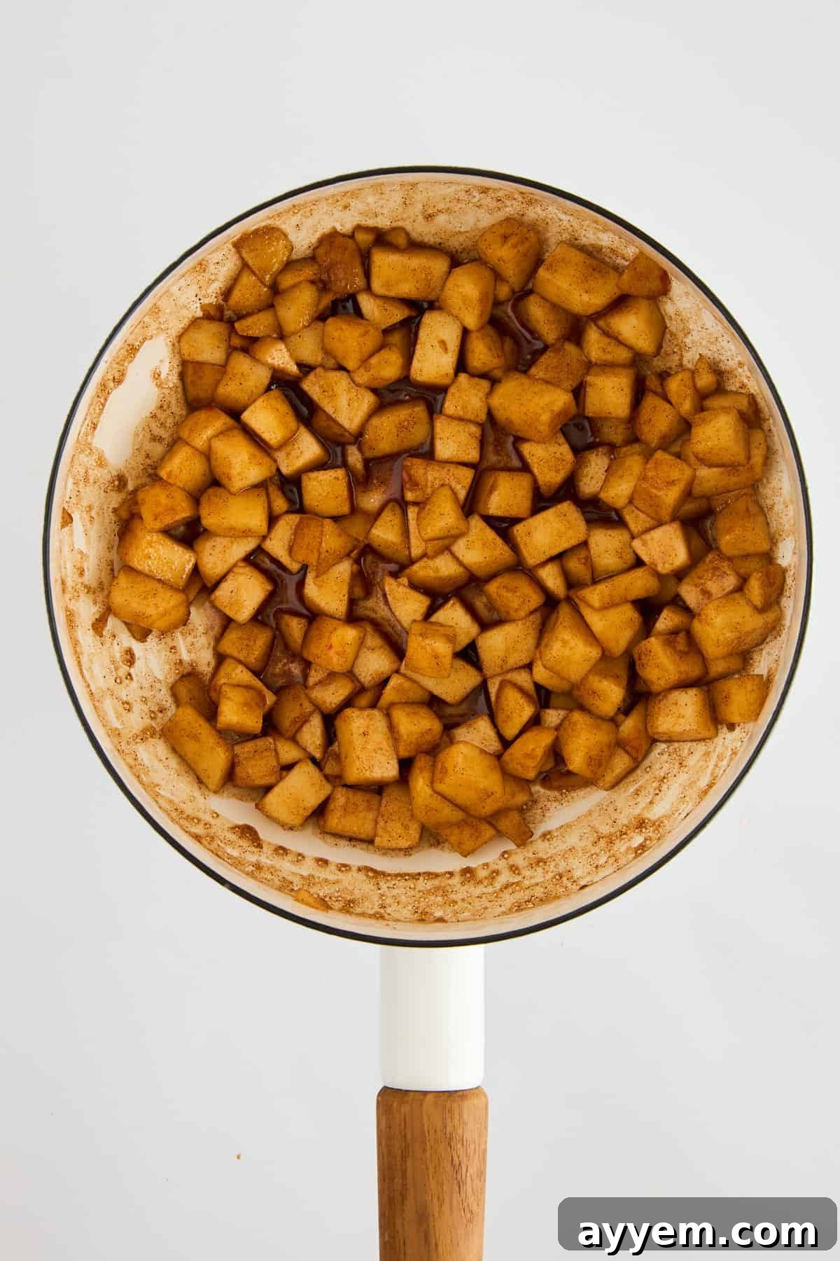 A bowl of freshly cooked One Pot Apple Cinnamon Oatmeal, ready to be served.