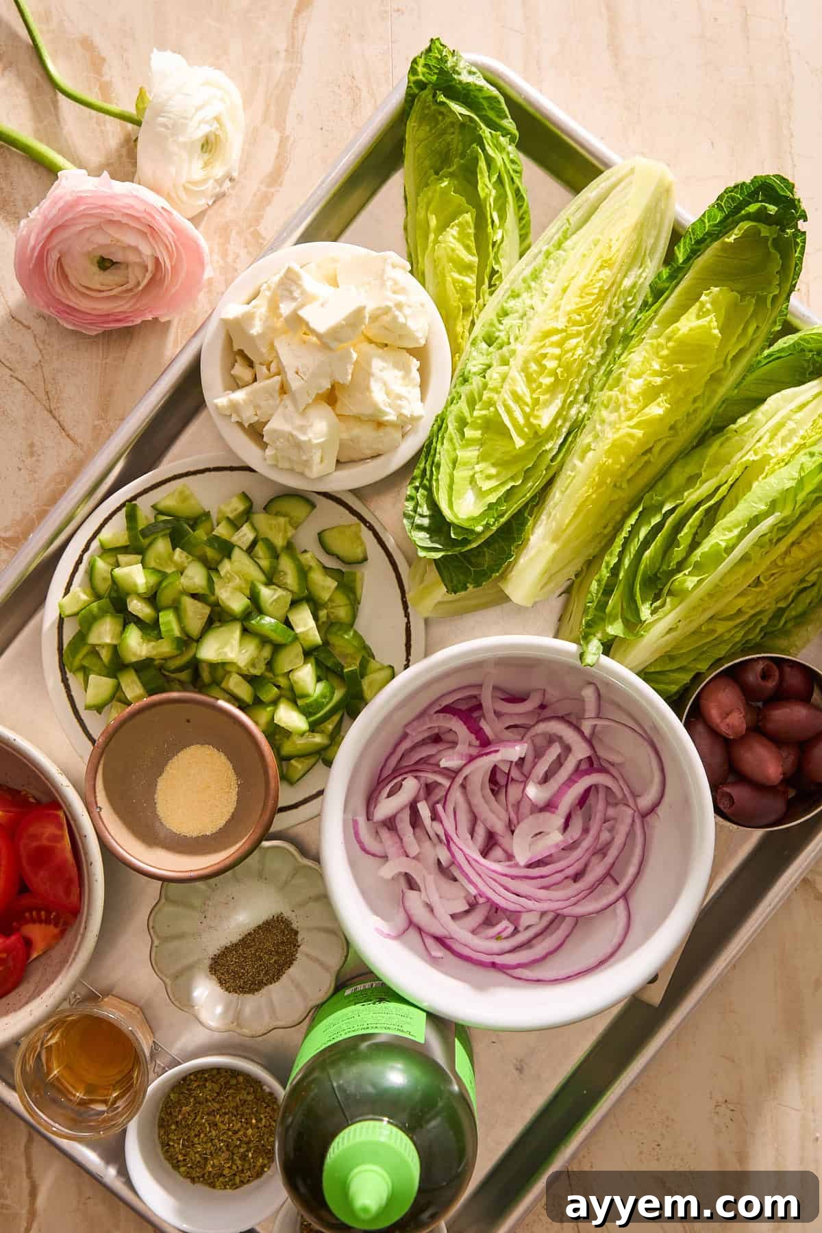 Close-up of fresh Greek salad ingredients including tomatoes, cucumbers, olives, and feta