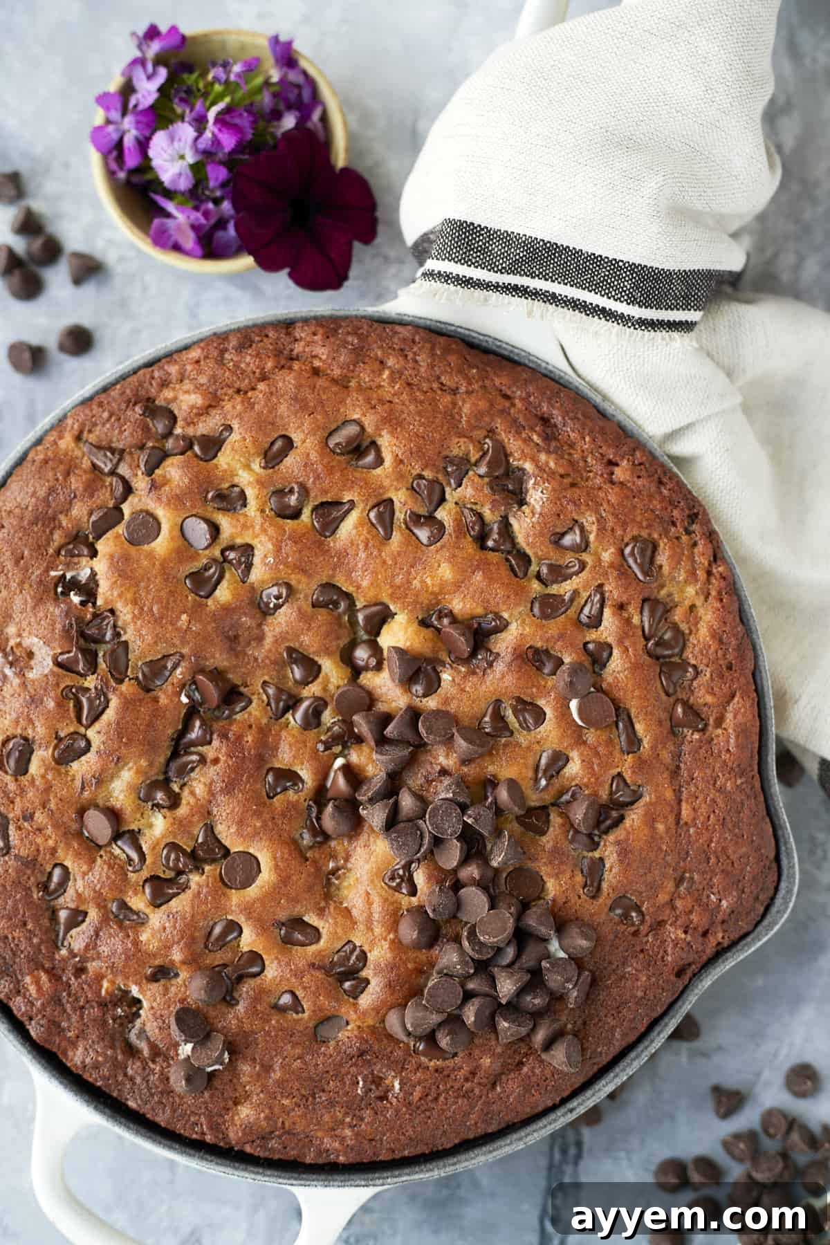 Overhead close-up of the skillet banana bread with chocolate chips on top