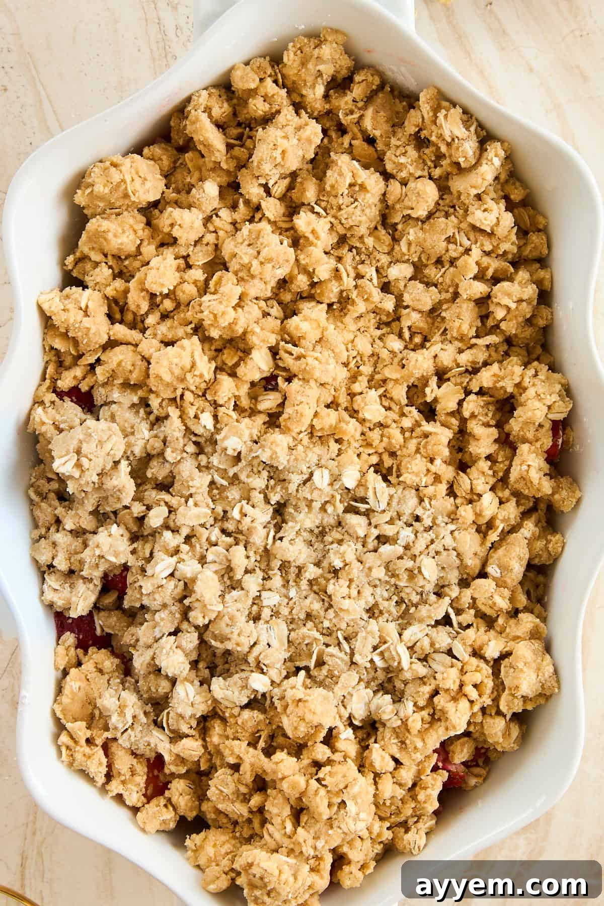 A baking dish full of strawberry crisp. 