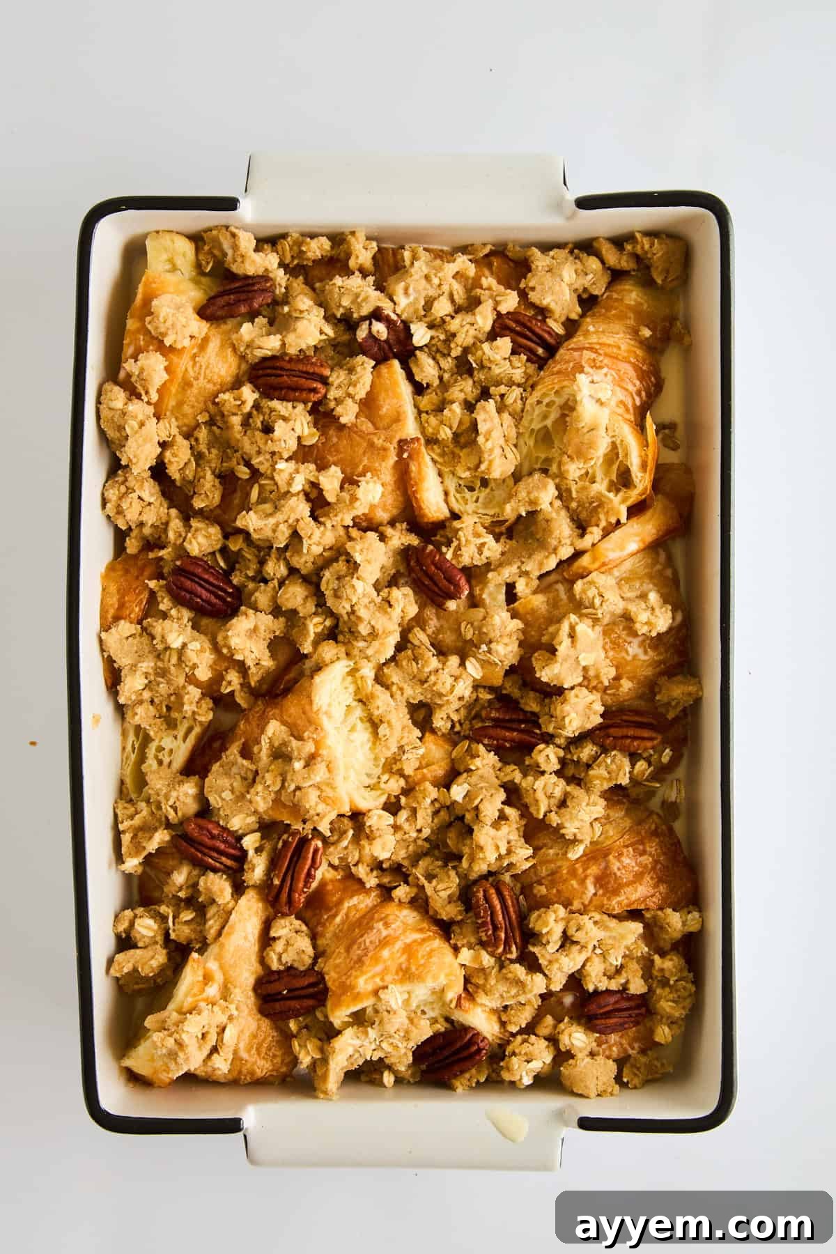 Decadent Pecan Croissant Pudding 5 Croissants soaking in rich custard.