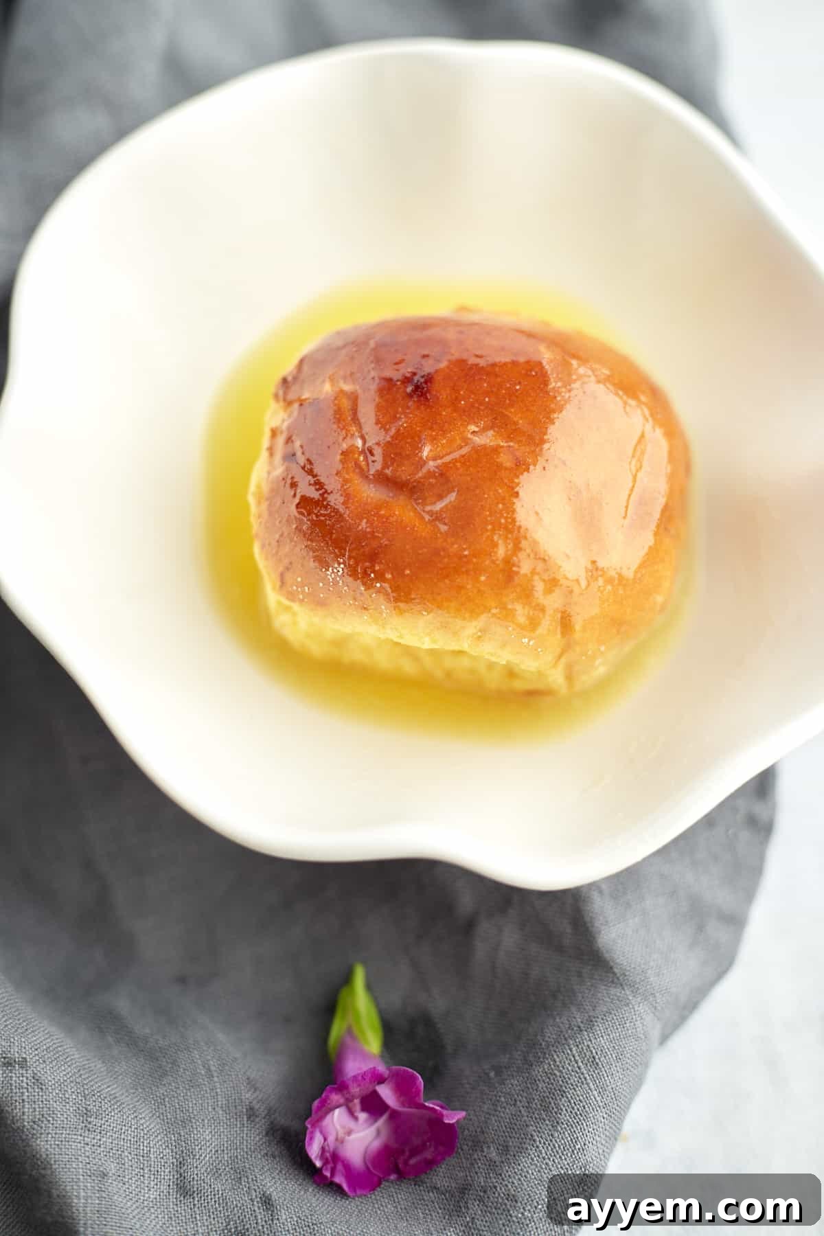 a brioche bun coated with melted butter