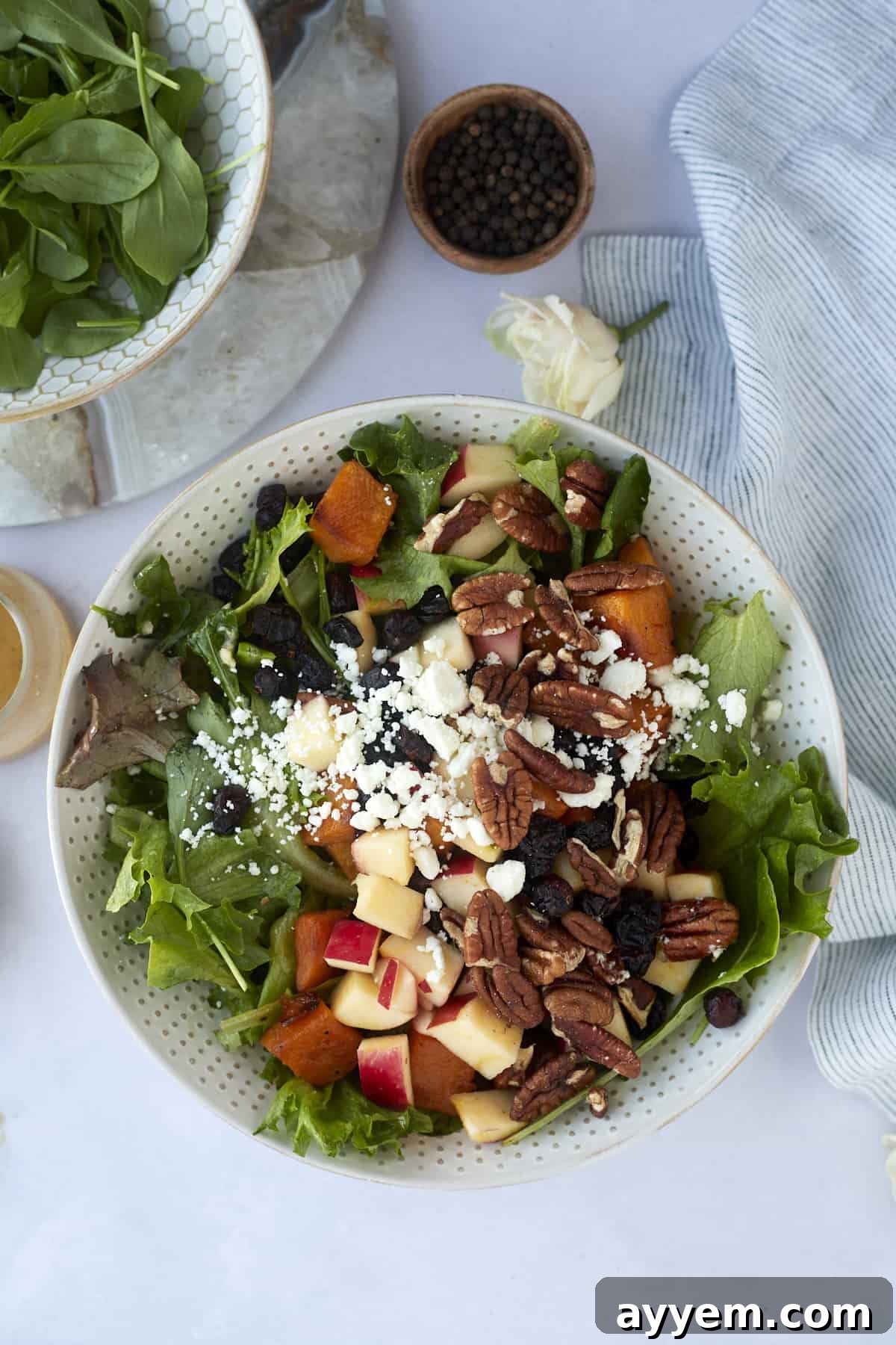 overhead image of a bowl of roasted butternut squash salad